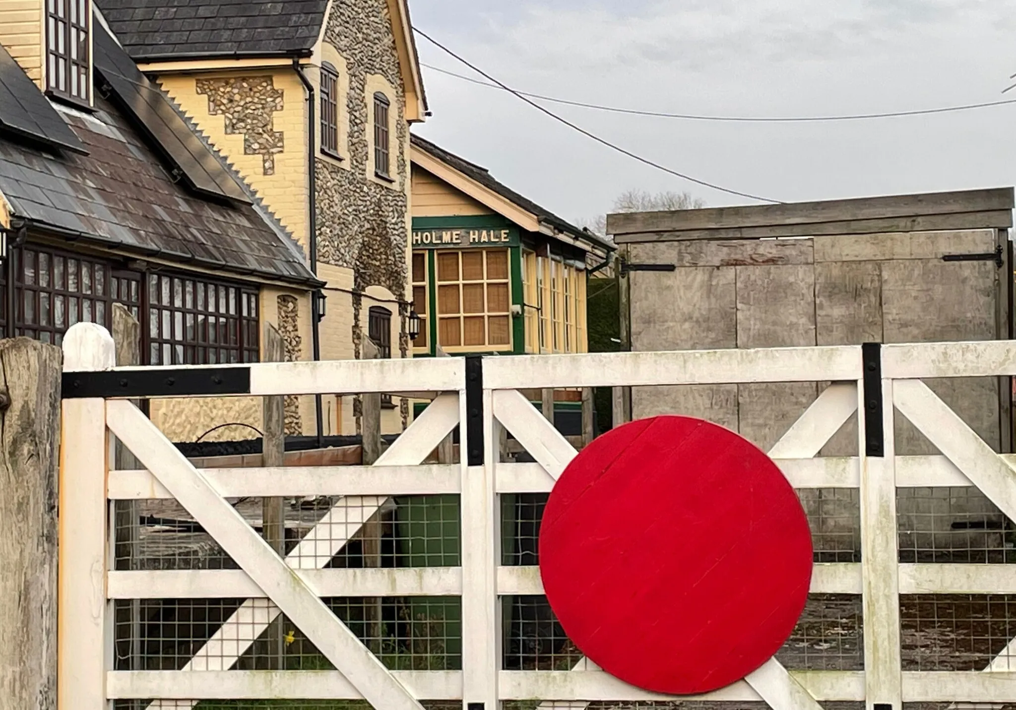 Photo showing: The Holmes Hale station in Norfolk is now disused and the buildings converted into private dwellings, here seen the station building