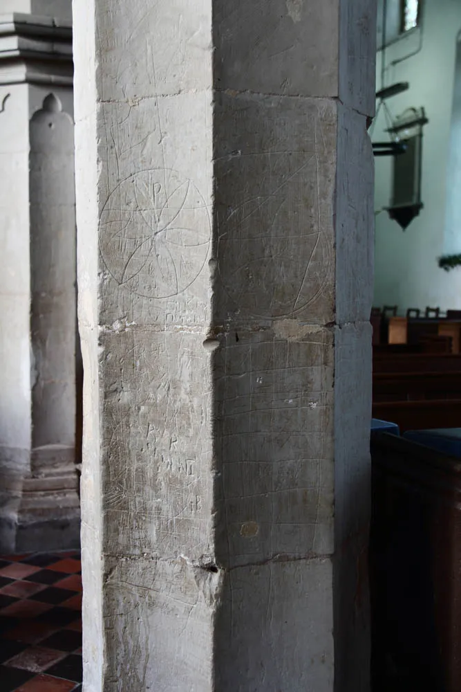 Photo showing: All Saints, Worlington - Graffiti on pillar