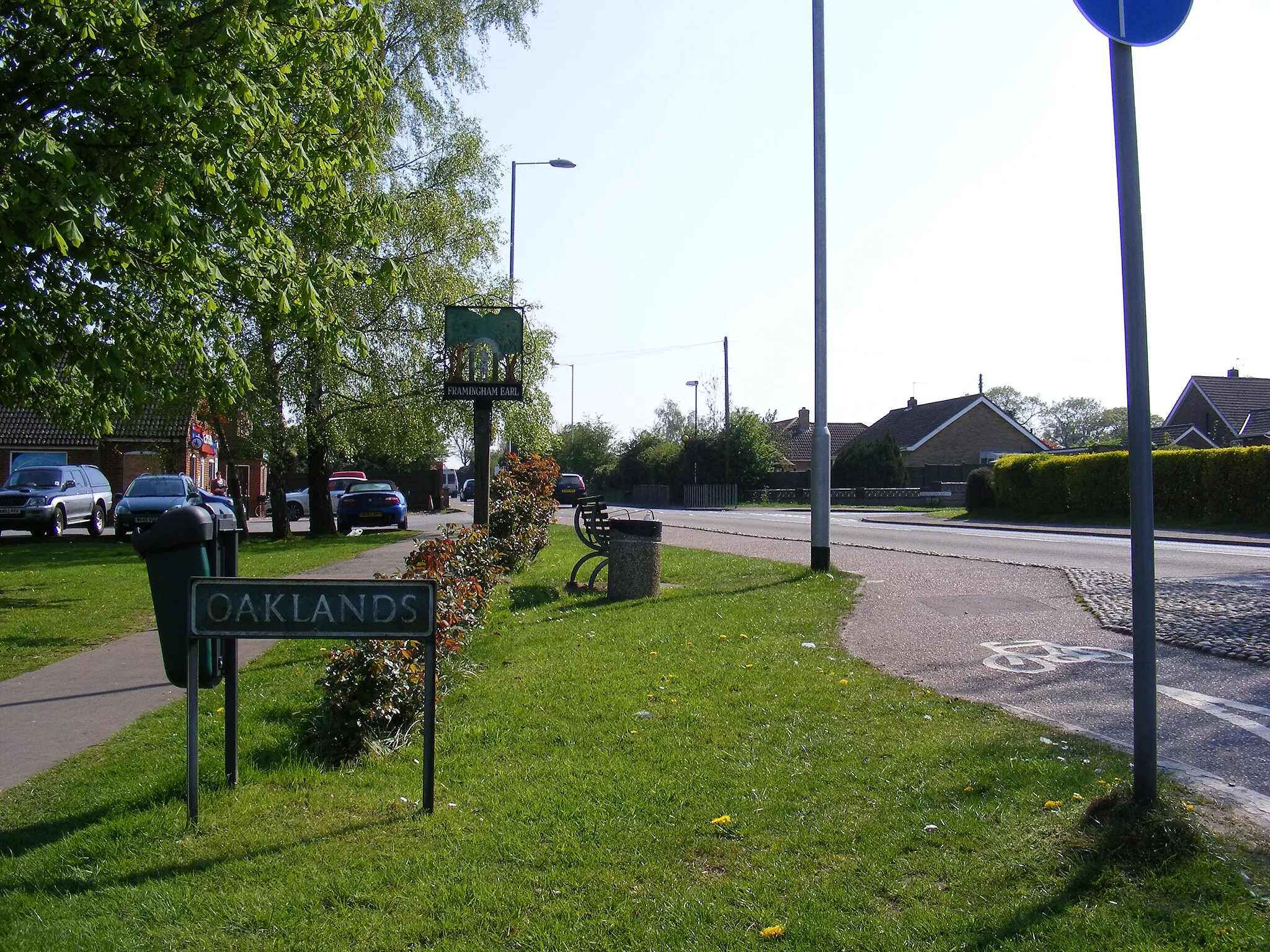 Photo showing: B1332 The Street, Framingham Earl & Framingham Earl Village sign
