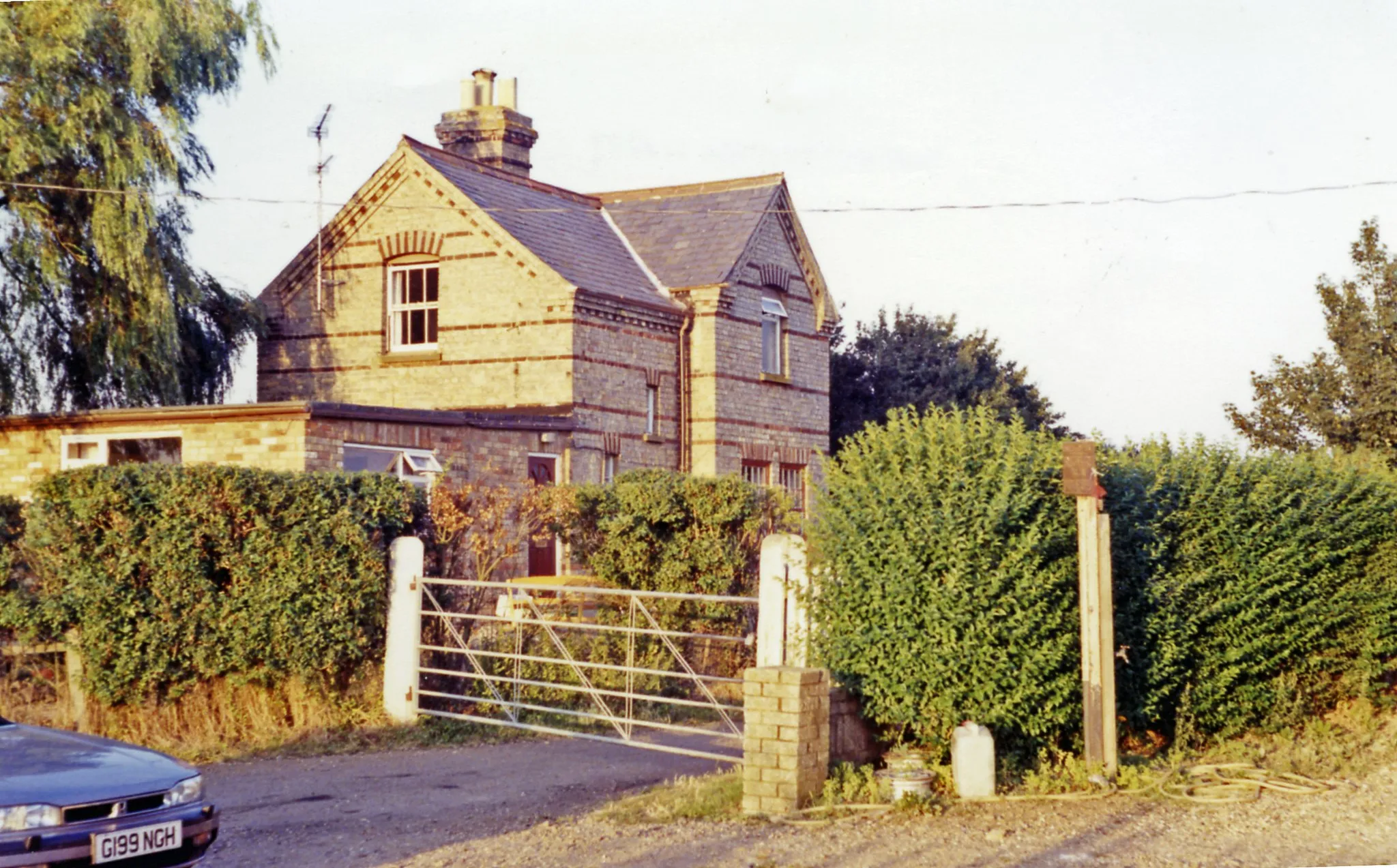 Photo showing: Abbey & West Dereham station (remains).
View eastward, towards Stoke Ferry: ex-GER Denver - Stoke Ferry branch. The station and branch lost their passenger service from 22/9/30, but goods continued on the branch until 19/4/65 - to Abbey until 31/1/6