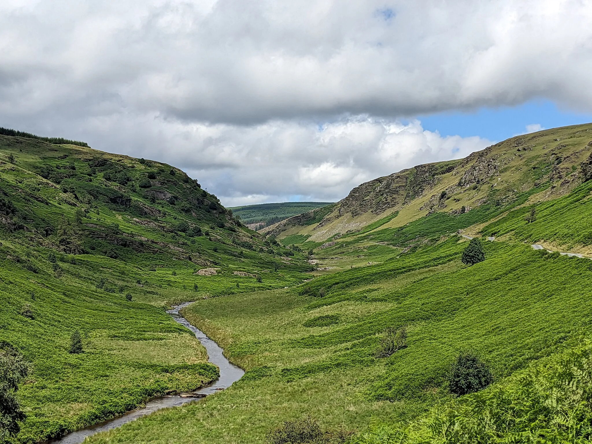 Photo showing: A view into the Abergwesyn valley, looking north-west. The river Irfon can be seen in the centre of the valley.