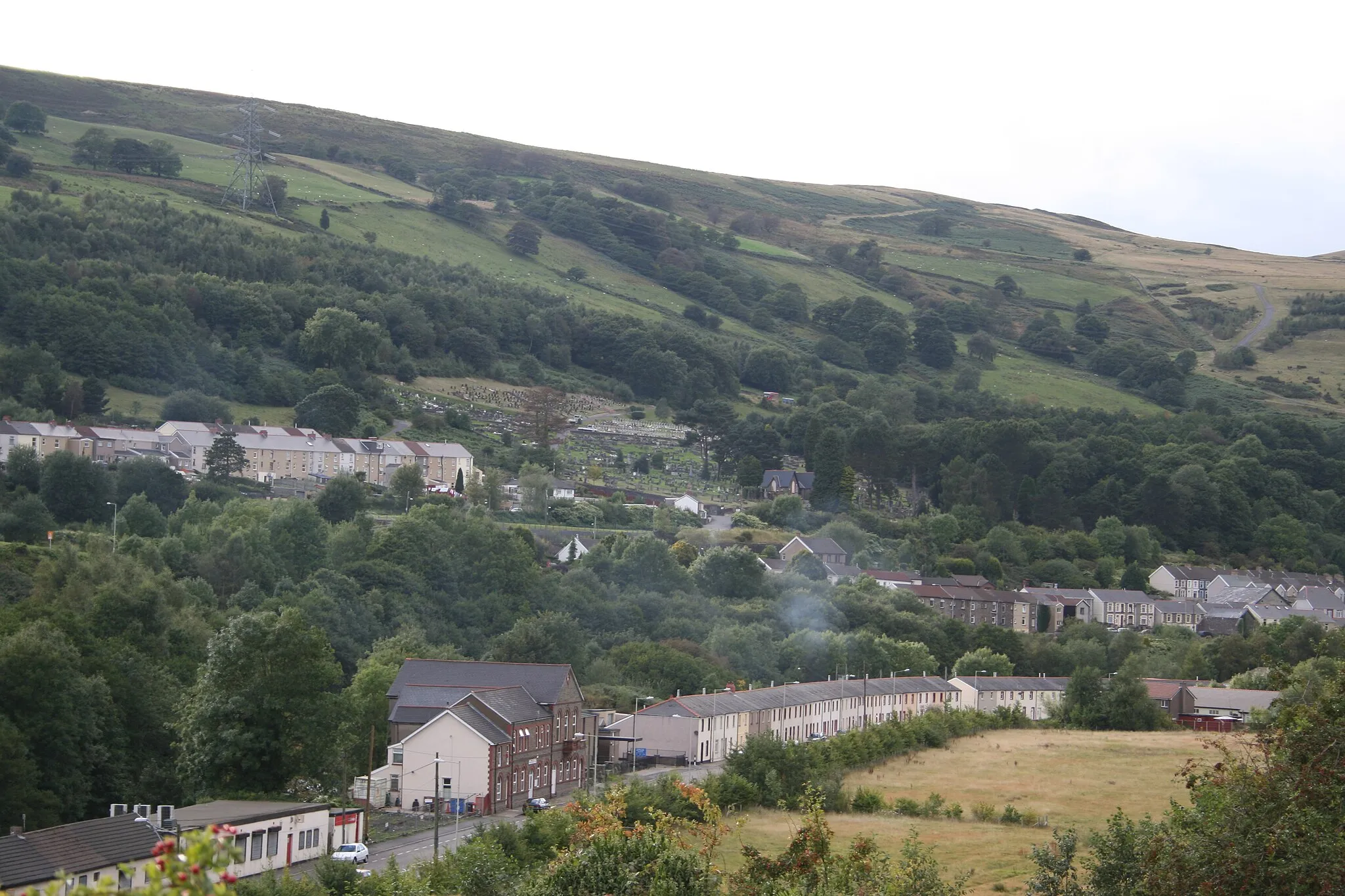 Photo showing: View of Merthyr Vale & Aberfan.  Aberfan cemetery can be seen on the hillside towards the middle of the photo.