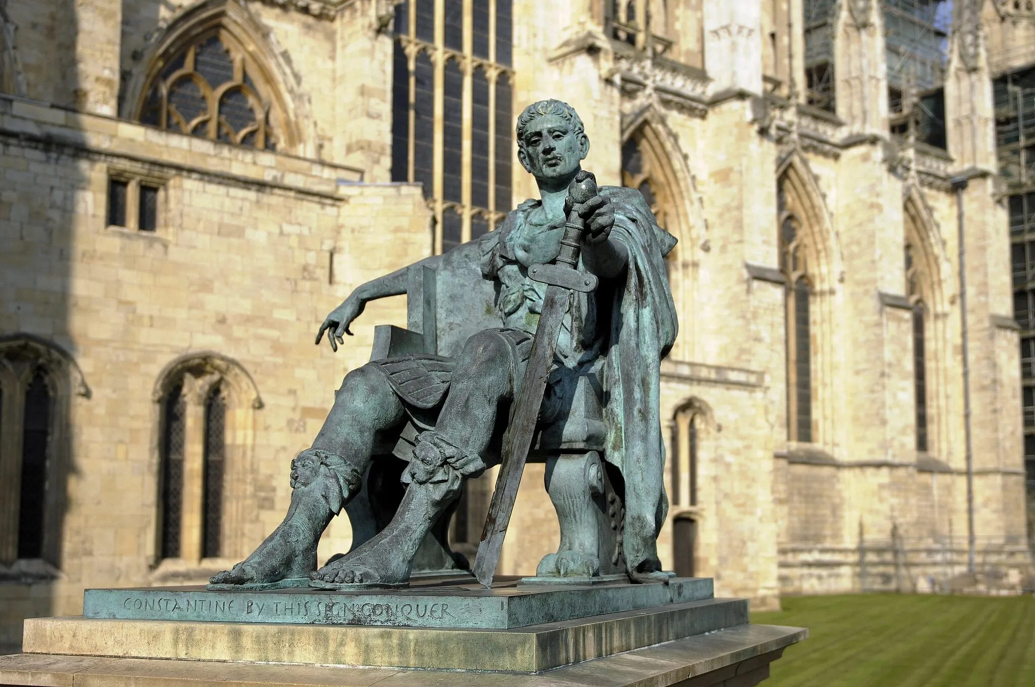 Photo showing: Bronze statue of Constantine the Great outside York Minster, England. The Emperor looks down upon his broken sword, which forms the shape of a cross. The statue was erected by the York Civic Trust and unveiled on 25 July 1998. (More facts)