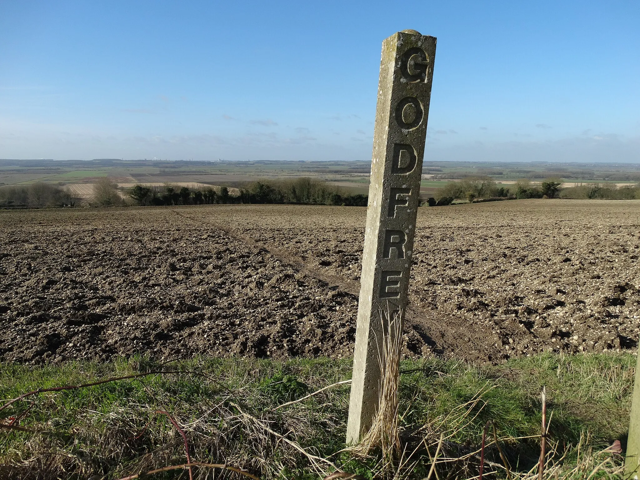 Photo showing: "Godfrey" boundary marker above Bonby