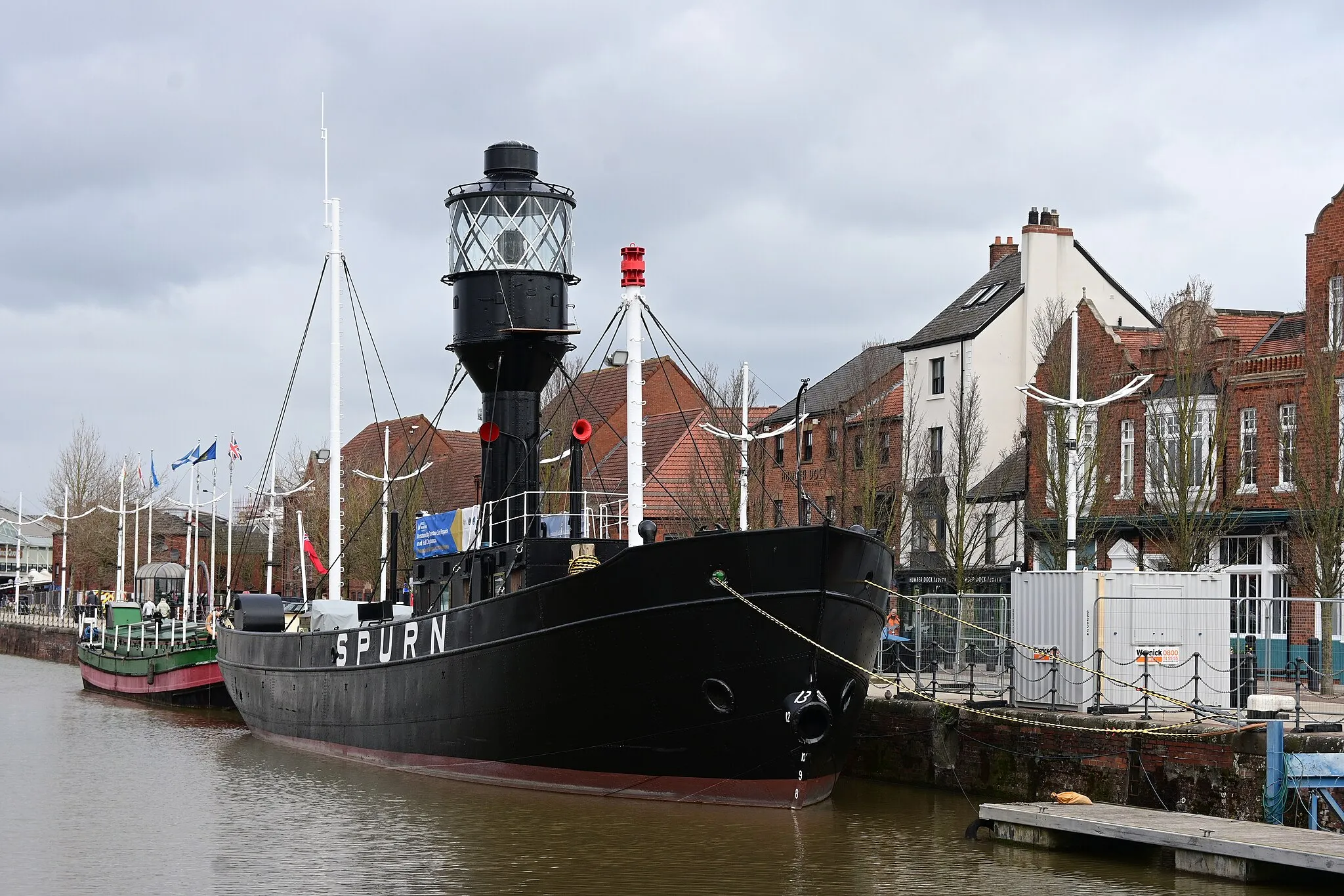 Photo showing: Fresh from its years-long refurbishment, the Spurn (1927) Lightship is back in Hull Marina in March 2023, temporarily moored in this spot until a permanent berth is constructed.