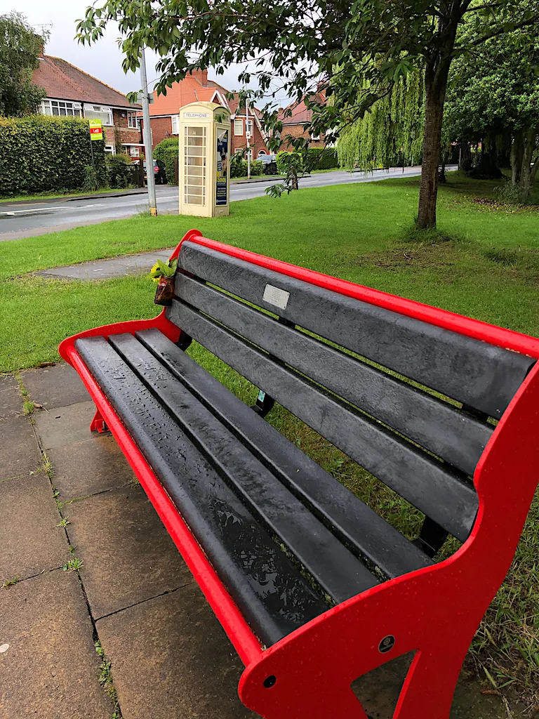 Photo showing: Bench and phone box, Kirk Ella, East Riding of Yorkshire, England. On the green area at the corner of School Lane and West Ella Road.