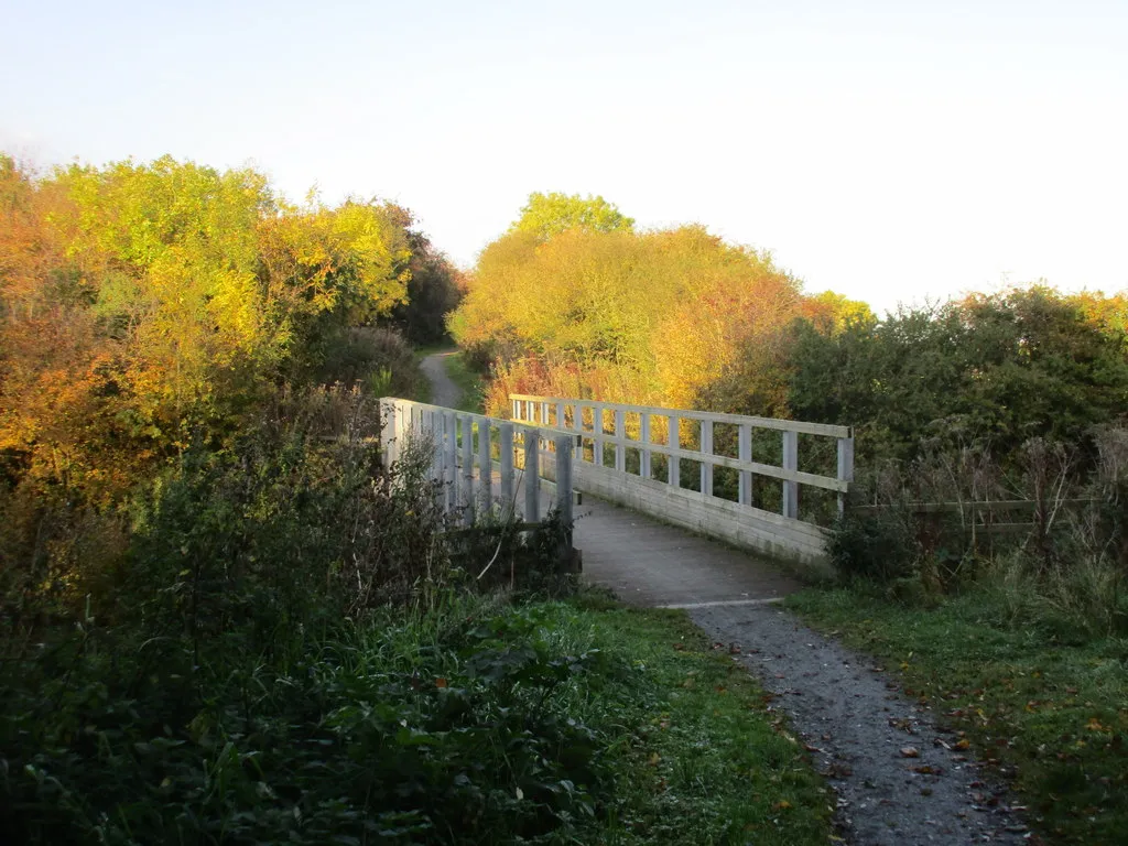 Photo showing: Bridge over the Lambwath Stream, Withernwick, East Riding of Yorkshire, England. This is at least the third bridge on this site. For a picture of the second bridge see TA1740 : Footbridge on the old Hull to Hornsea railway trackbed. Before that there would have been a railway bridge some 15-20 feet higher.