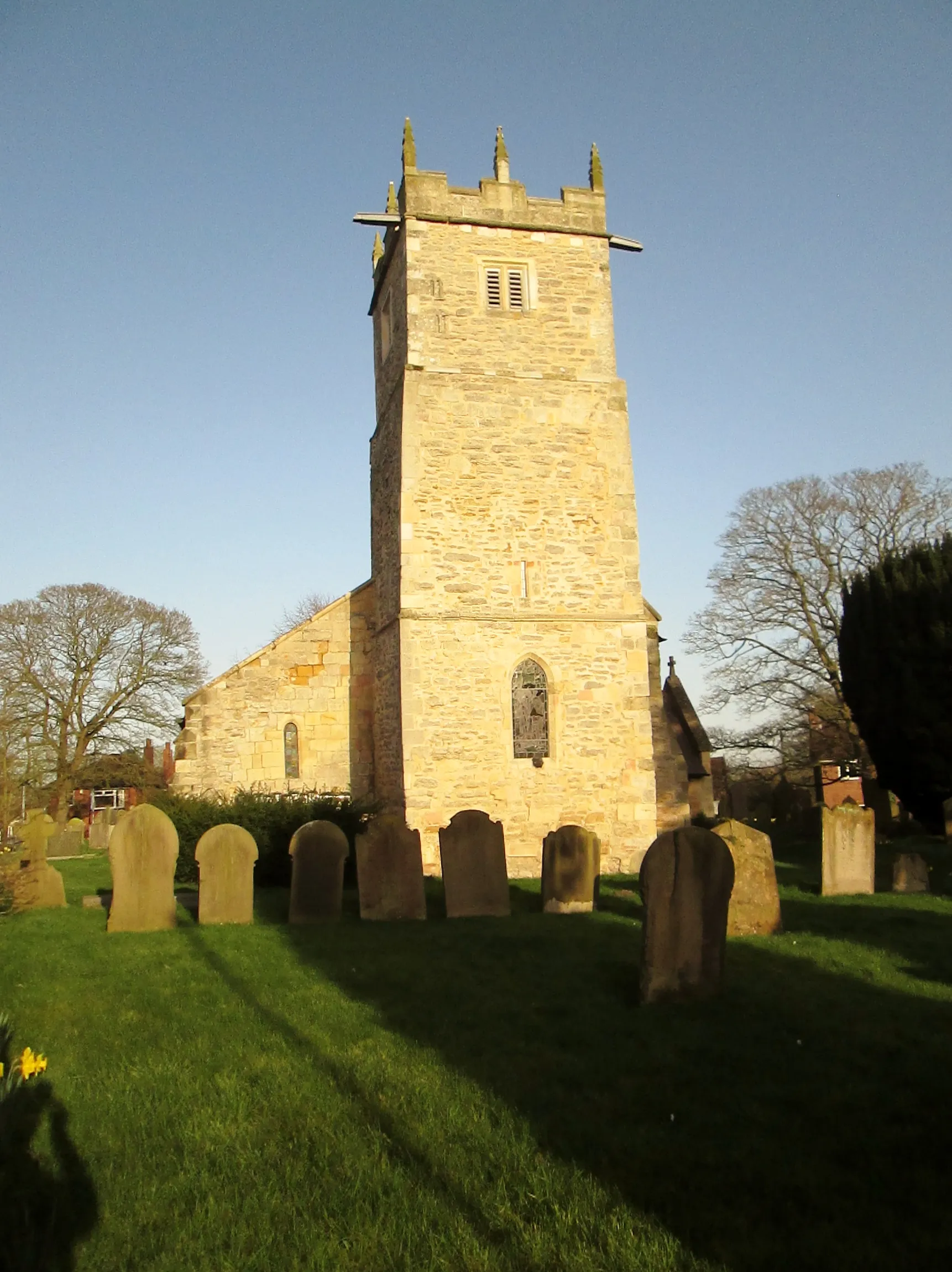 Photo showing: Afternoon  sun  lights  up  All  Saints  Parish  Church