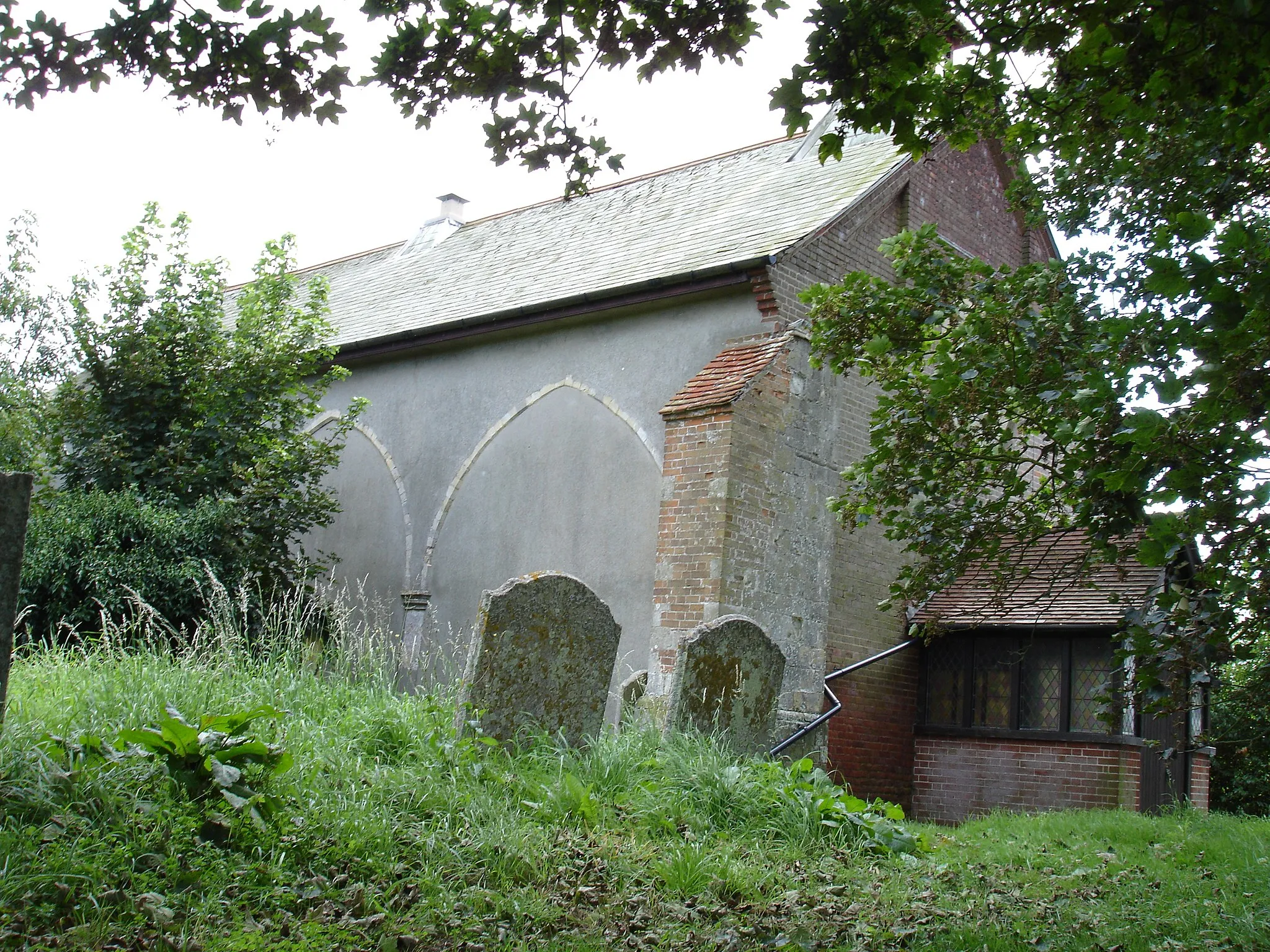 Photo showing: Photograph of the remains of Wix Priory, Wix, Essex, England, now forming the north wall of the church of St Mary the Virgin