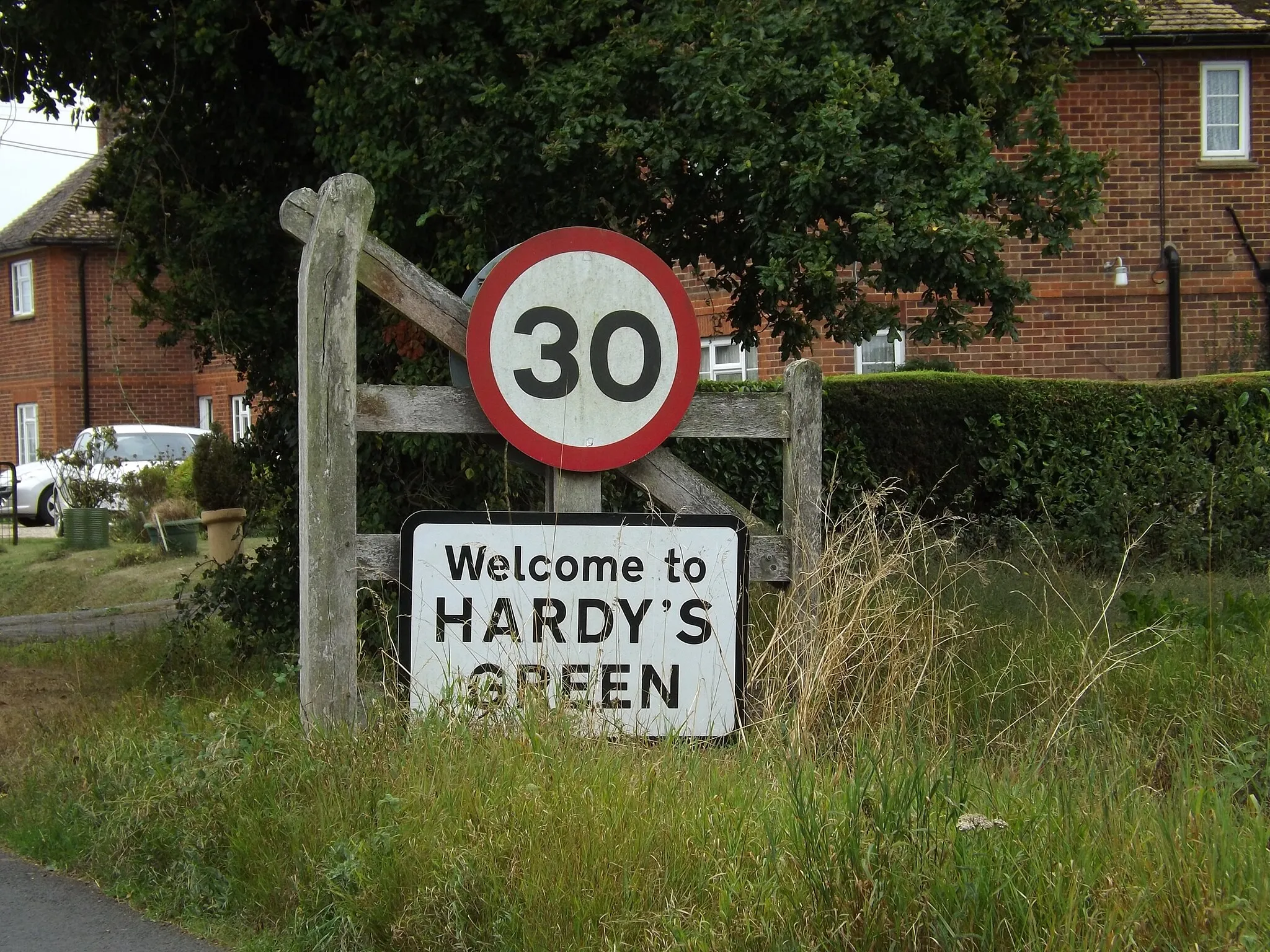 Photo showing: Hardy's Green Village Name sign