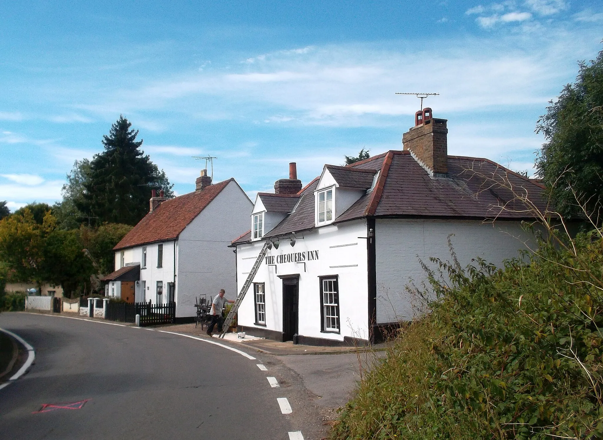 Photo showing: Painting The Chequers