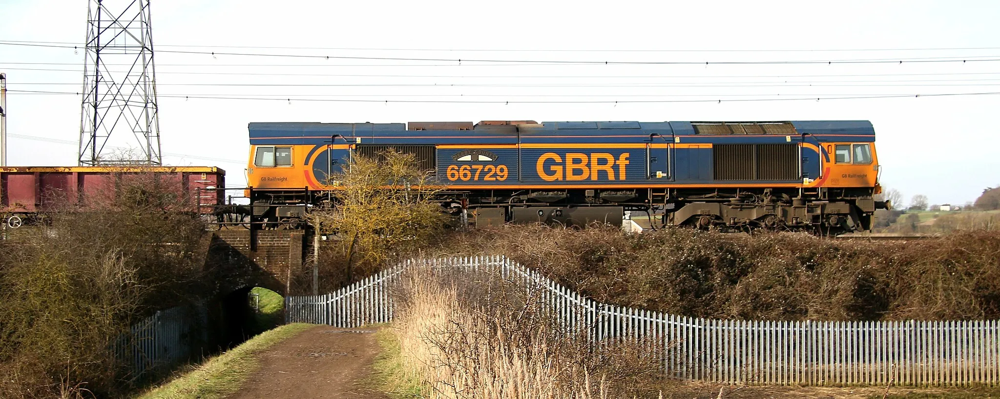 Photo showing: An Engineers' working from March Yard to Thorpe-le-Soken provided an interesting diversion from the usual diet of Freightliner workings on the River Stour bridge at Cattawade this afternoon (20/2/21) The train will reverse in Colchester Down Goods Loop and was Top 'n' Tailed with GBRF Class 66 power , 782 leading from March with 729 leading on to the branch.