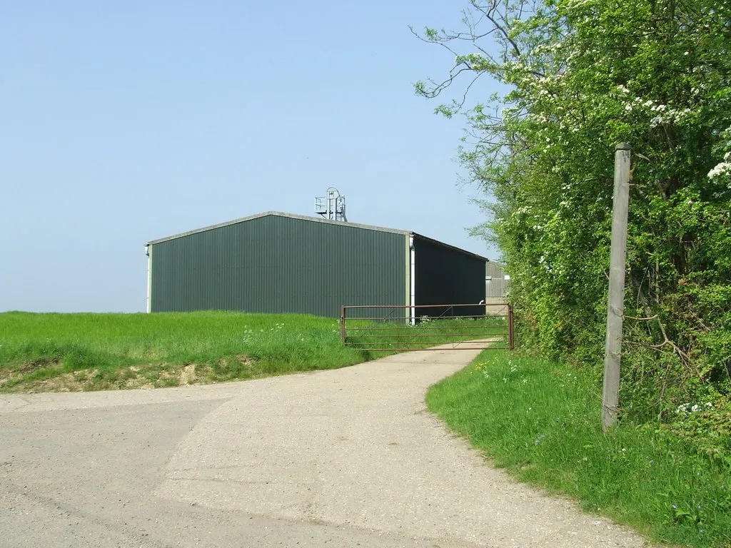 Photo showing: Footpath Sign And Moat Farm