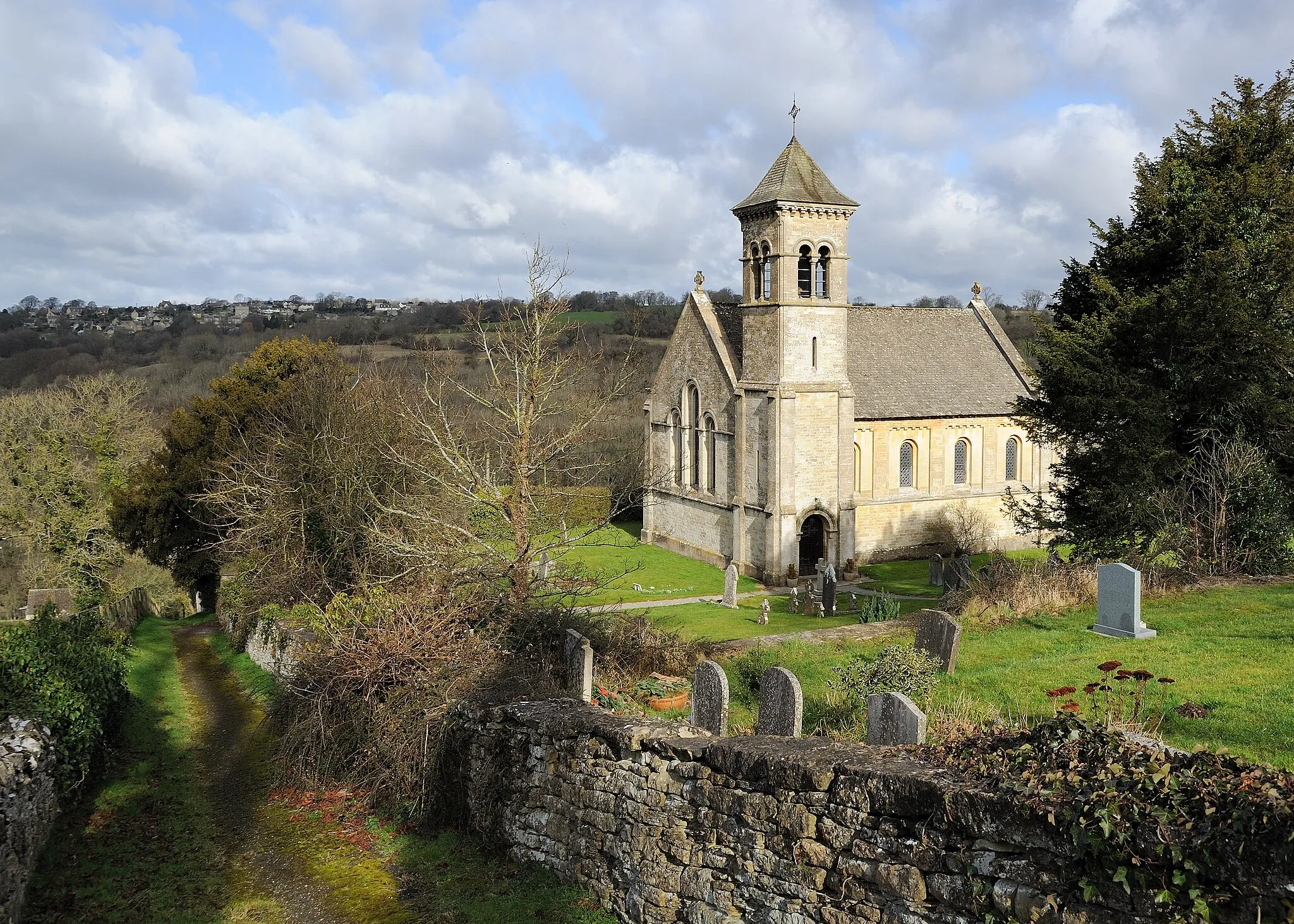 Photo showing: St Luke's Church in Frampton Mansell was built in 1843 by Lord Bathurst. The church sits on the top of a deep valley within the Cotswolds. The Italian style design is by J. Parish. There are a set of original five stained glass windows within the apse with one dedicated to Christ and one each for the apostles Matthew, Mark, Luke and John. 
St Luke's Church is an English Heritage Grade II Listed Building: http://list.english-heritage.org.uk/resultsingle.aspx?uid=1089675