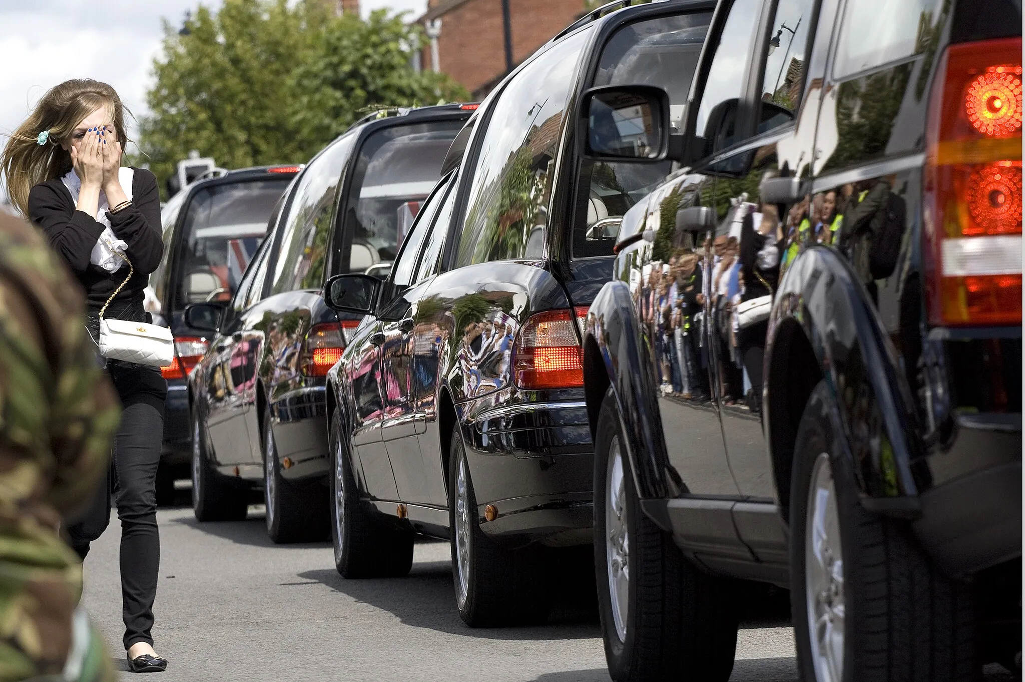 Photo showing: A convoy of hearses carrying the bodies of military personnel through Wootton Bassett, Wiltshire, England