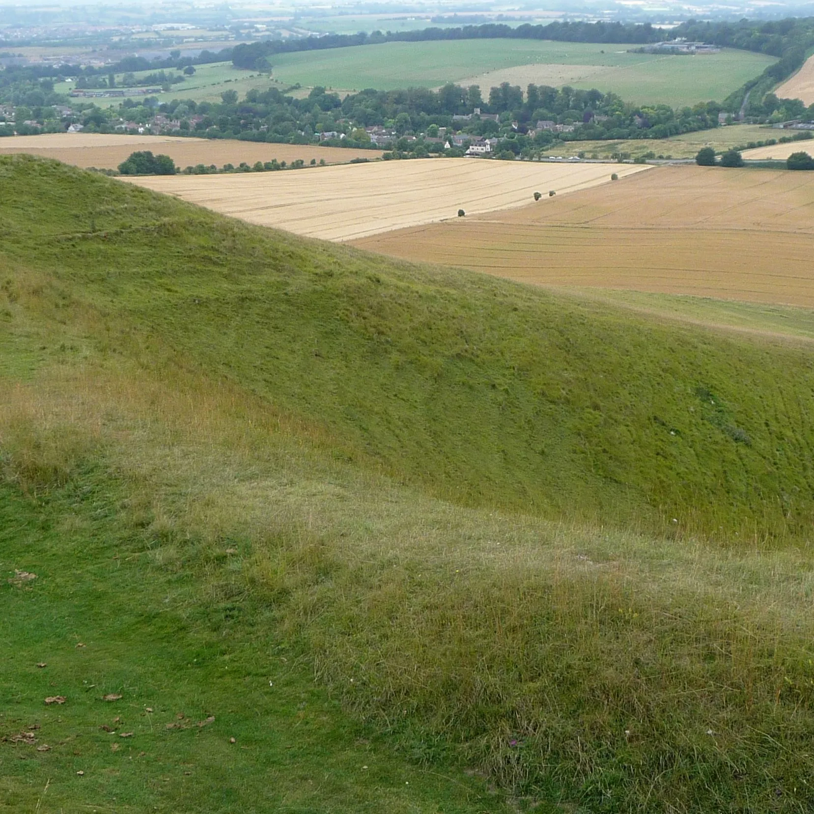 Photo showing: This is a view from Cherhill White Horse looking down to the village of Cherhill