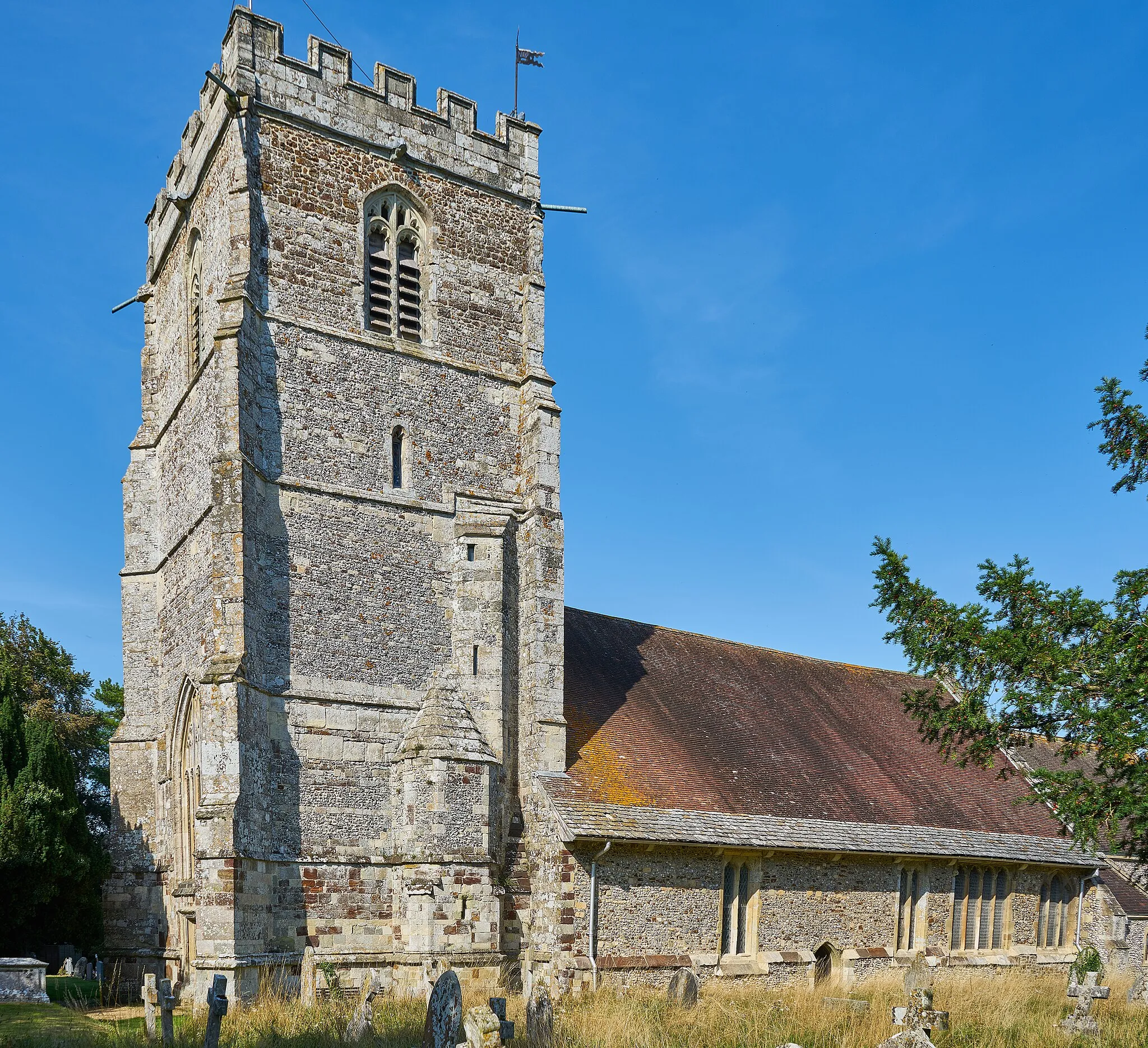 Photo showing: The massive 15th century tower of Cranborne's parish church dominates the village.
