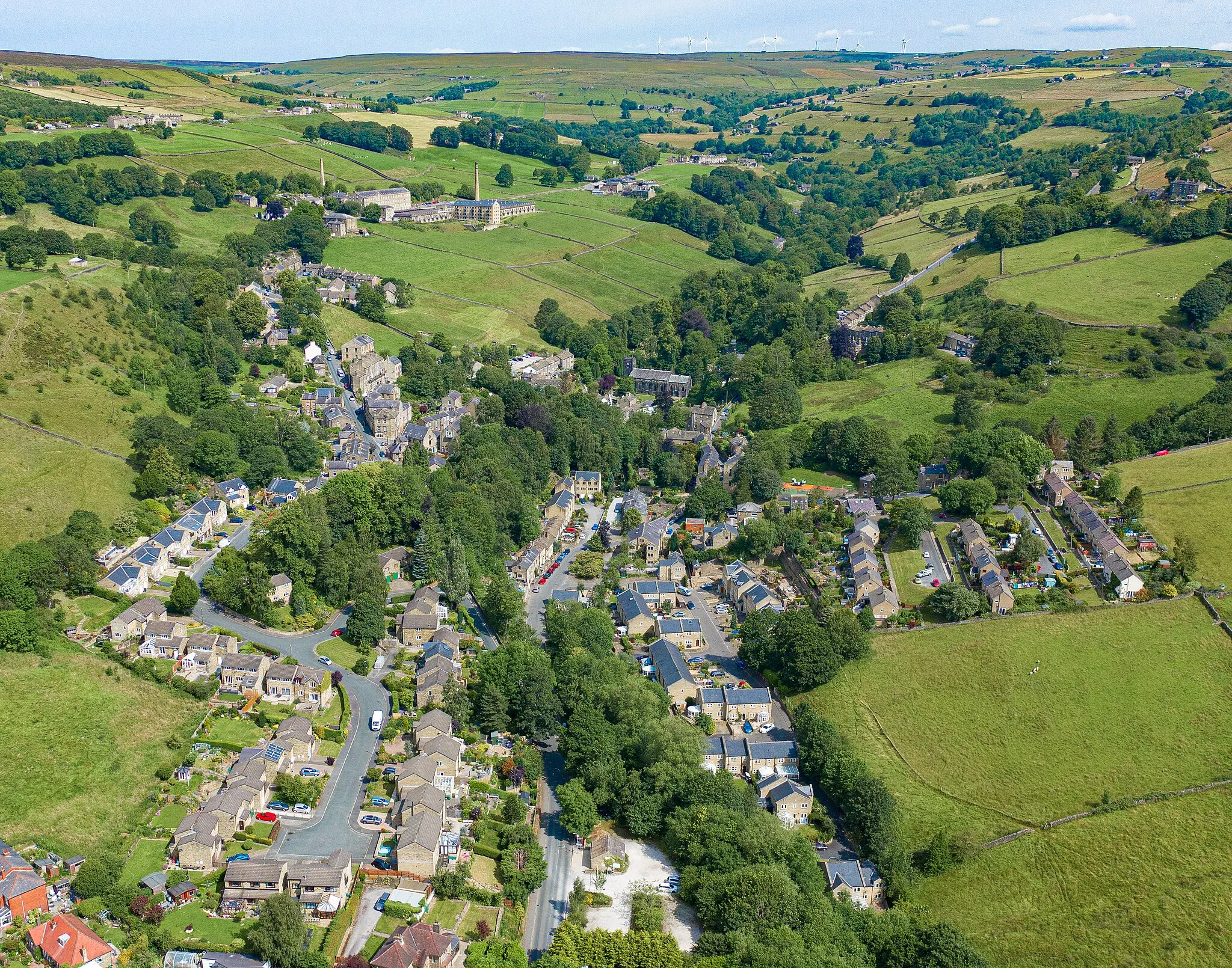 Photo showing: Aerial view of Luddenden looking north towards Oats Royd Mill and surrounding areas.