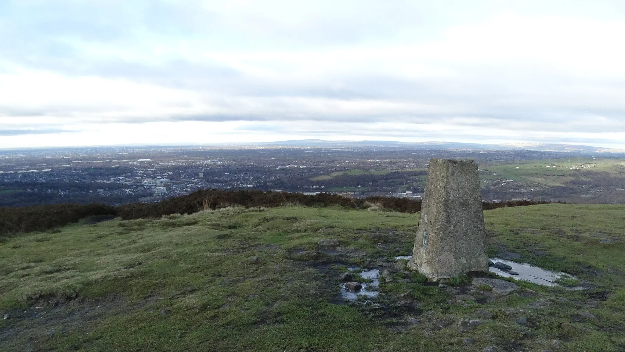 Photo showing: Trig point on Wild Bank Hill & view over Stalybridge