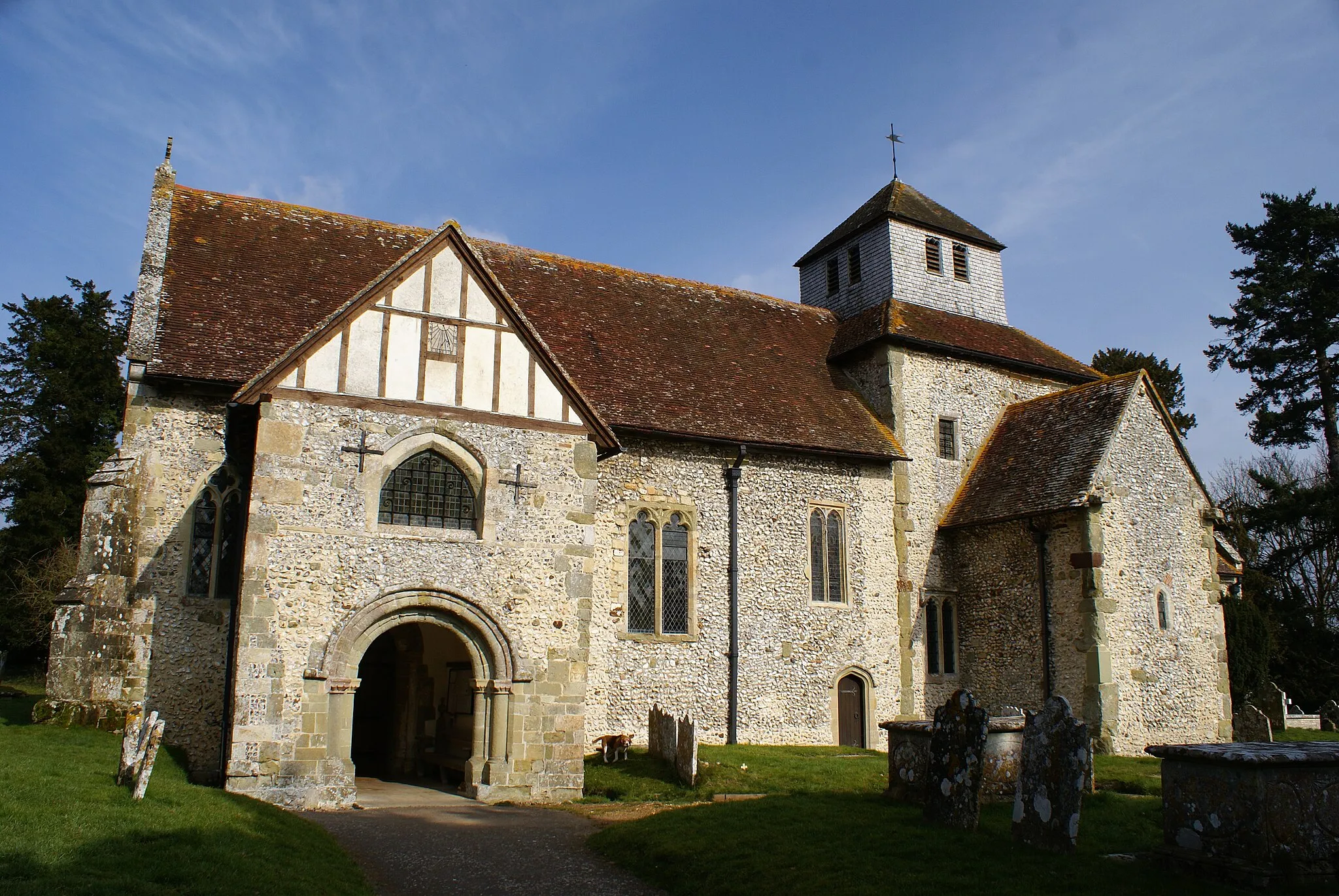 Photo showing: St Mary's parish church, Breamore, Hampshire: view from the southwest, showing the south porch (left) and south porticus (right)