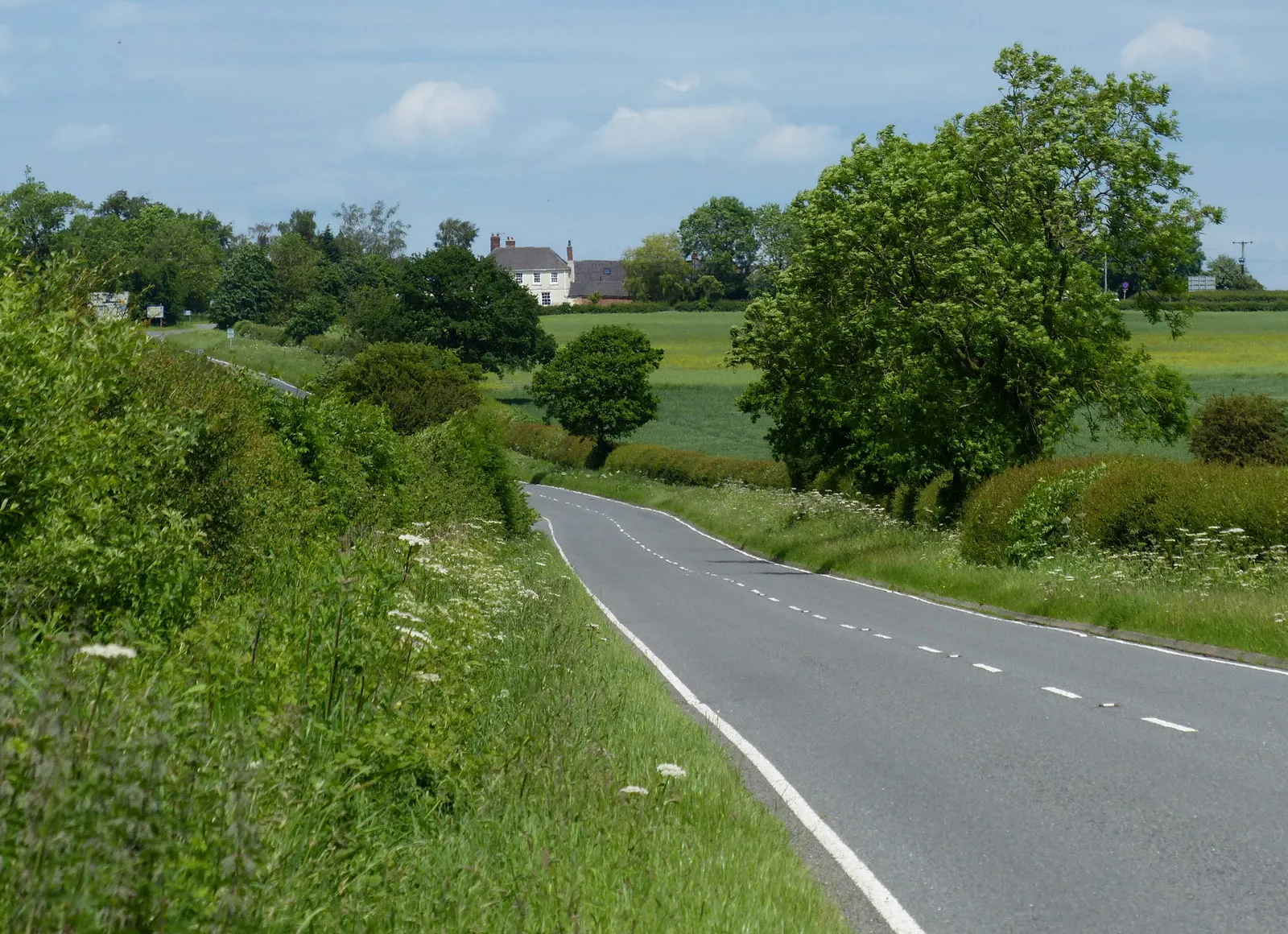 Photo showing: B4455 Fosse Way heading north towards High Cross