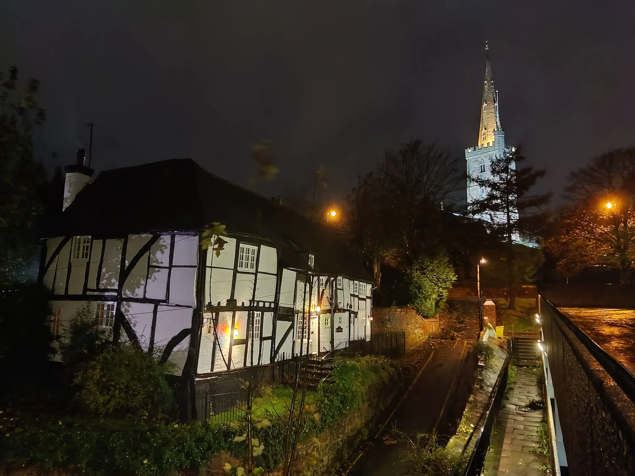 Photo showing: Whitefriars, Church Lane, Halesowen, England, at night with the parish church of St. John the Baptist in the background.