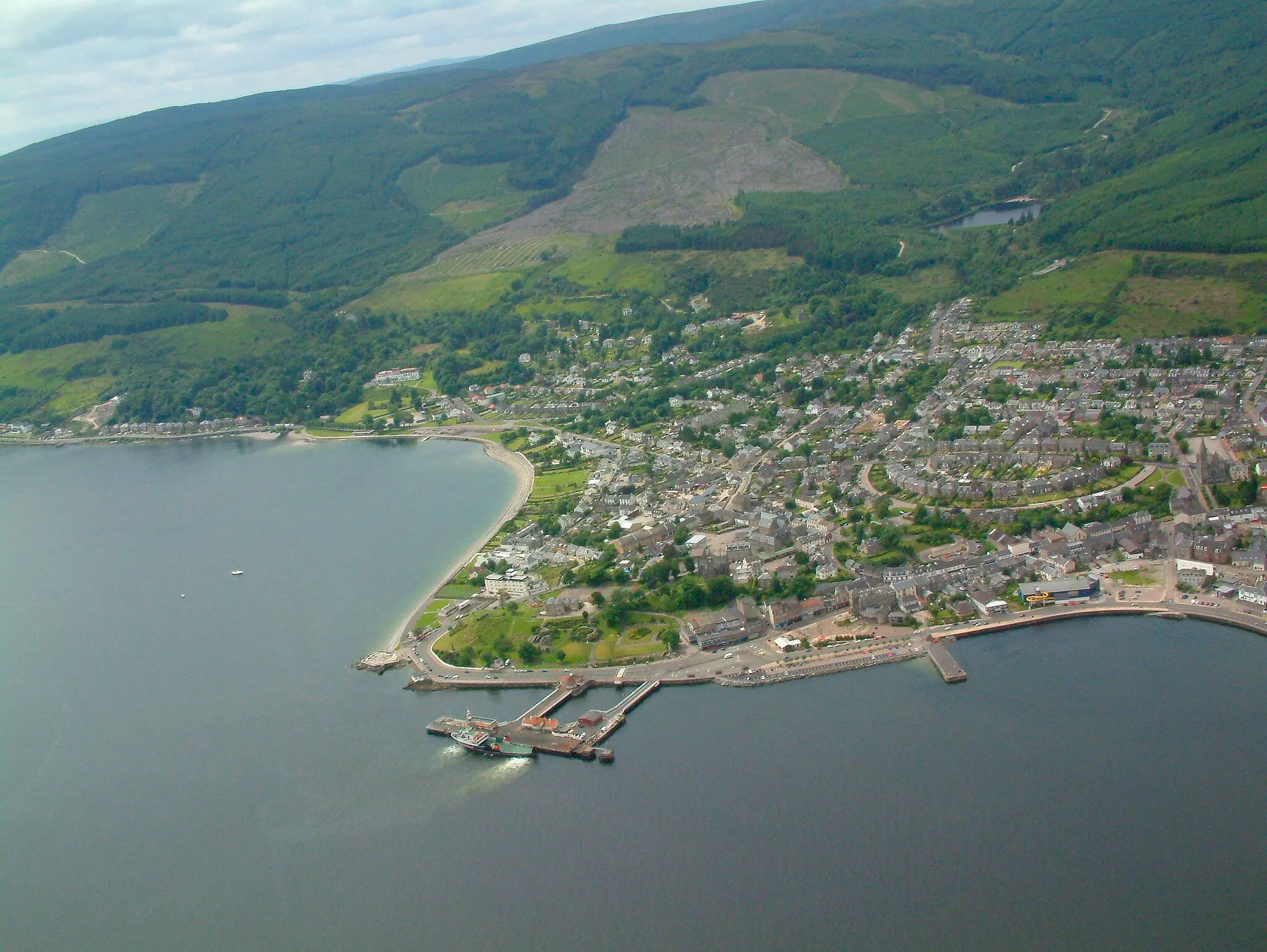 Photo showing: Dunoon from above the Firth of Clyde Side thrusters working on the vessel coming in to the pier.