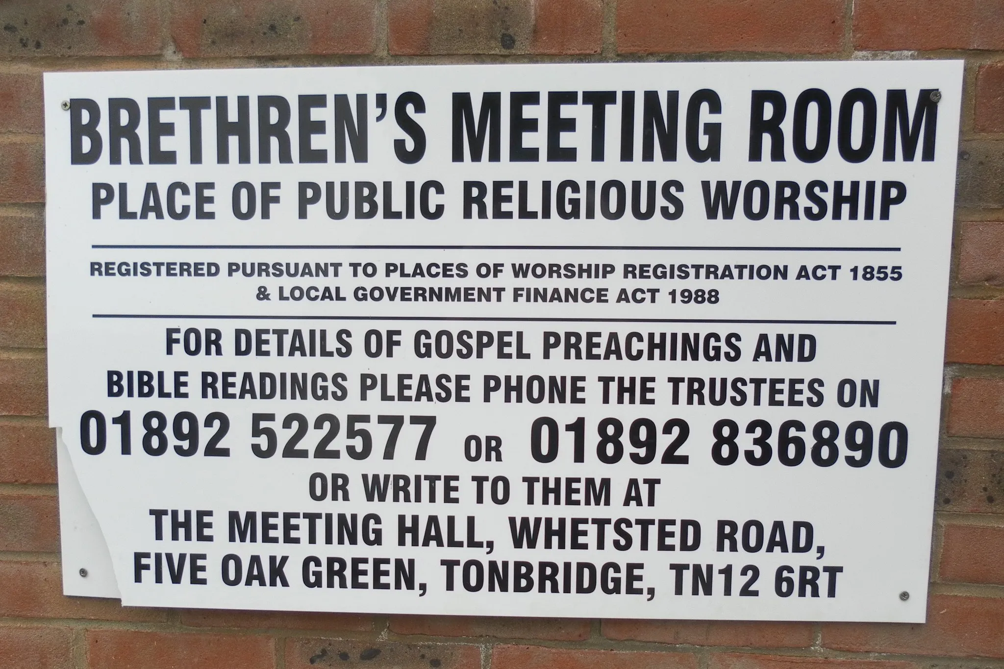 Photo showing: A sign outside the Five Oak Green Meeting Room (Brethren place of worship), Whetsted Road, Five Oak Green, Kent, England.  This is in the standard style for Brethren meeting rooms, stating that the building is a registered place of worship and giving contact details.