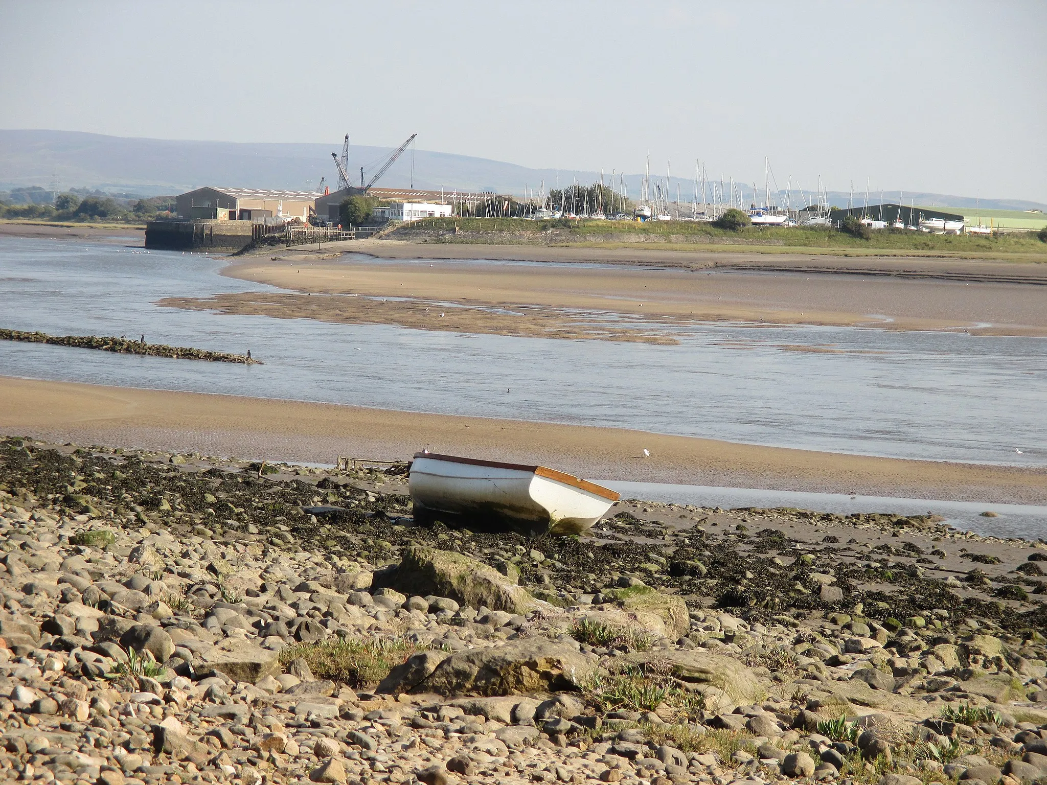 Photo showing: Glasson Dock, photographed from several hundred yards to the north-west at Bazil Point.  The estuary of the River Lune lies between.