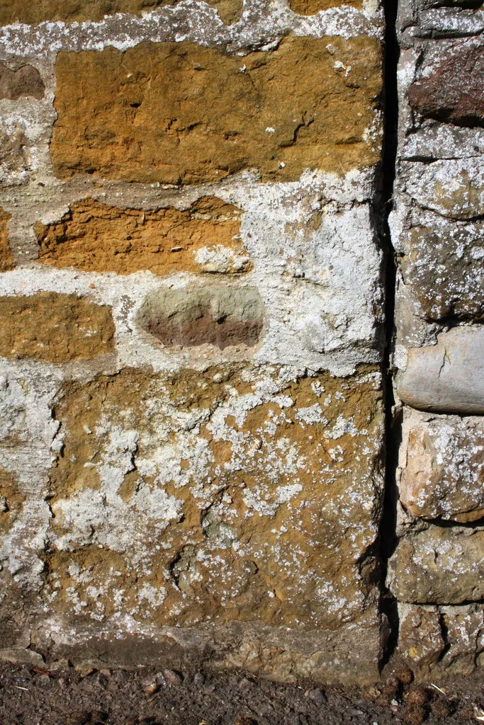 Photo showing: Weathered benchmark on 'The Old Post Office' outbuilding