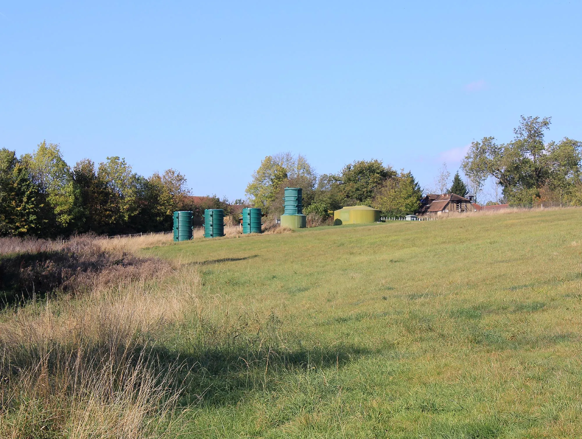 Photo showing: A line of tanks near Lower Farm