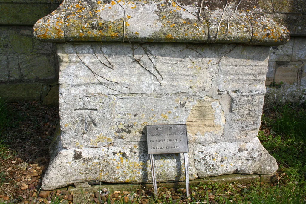 Photo showing: Benchmark on buttress of All Saints Church