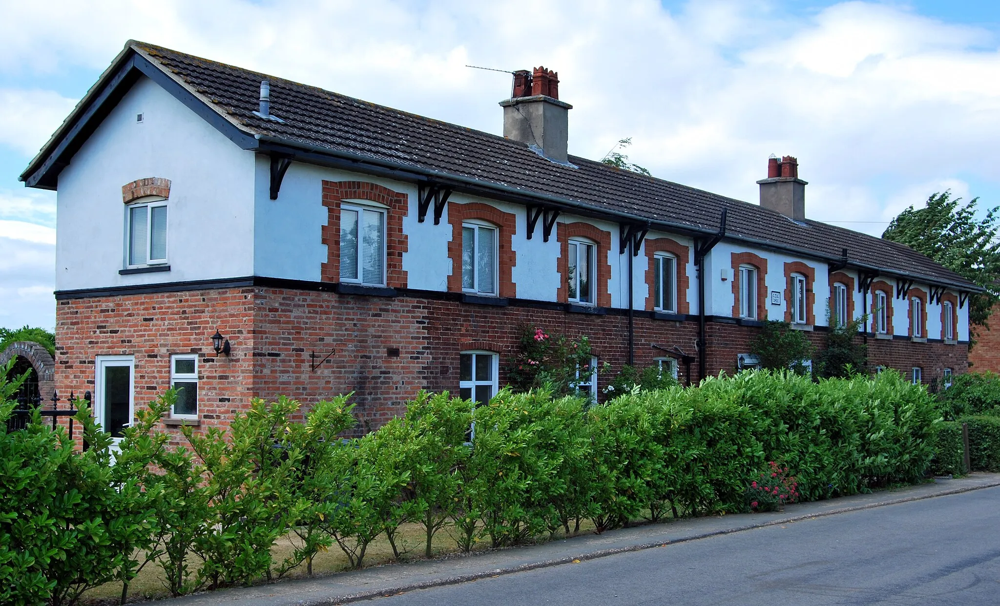 Photo showing: Harlaxton, cottages built by Gregory.