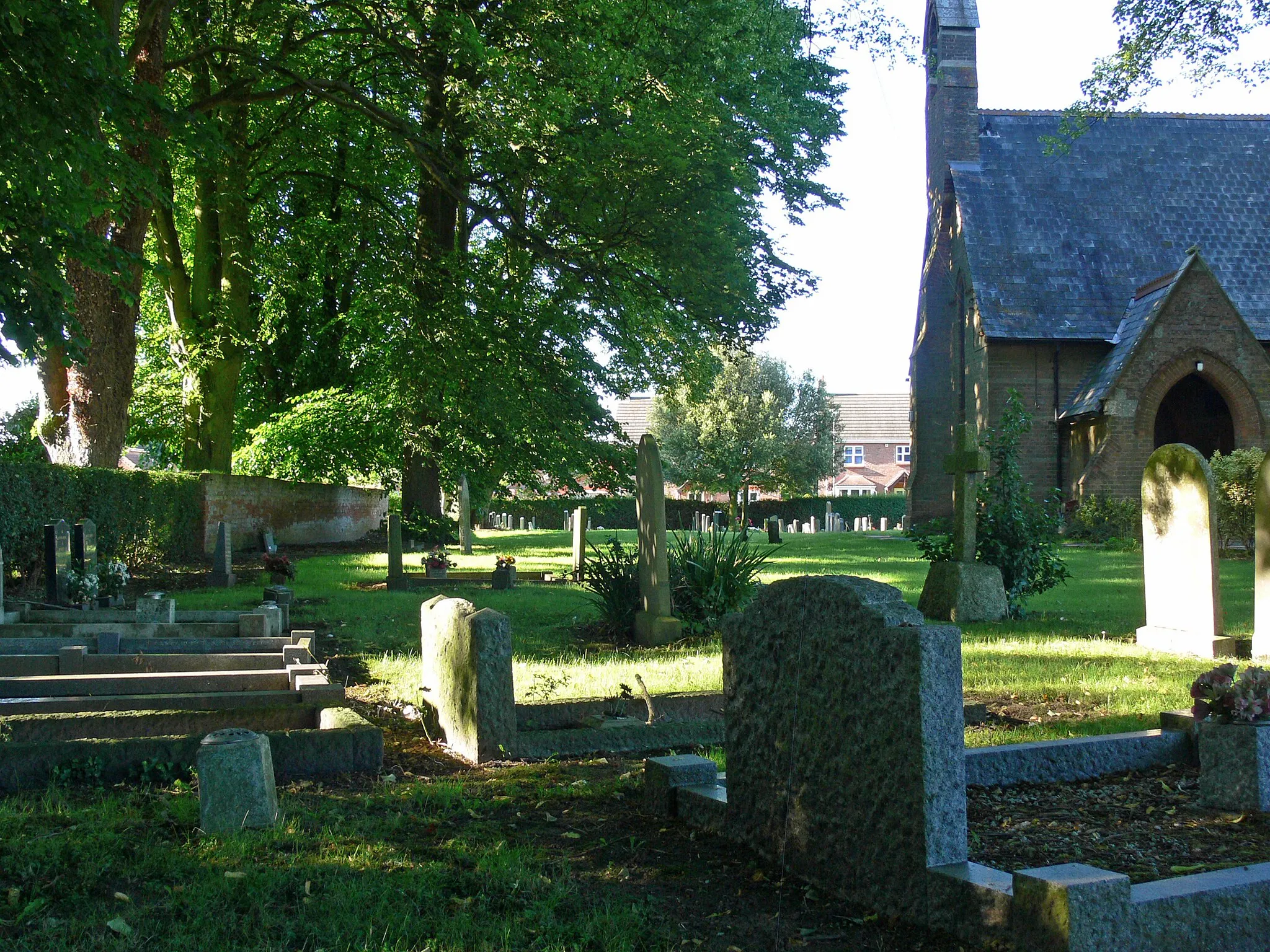 Photo showing: Gravestones at St Marks Church in Holbeach St Marks