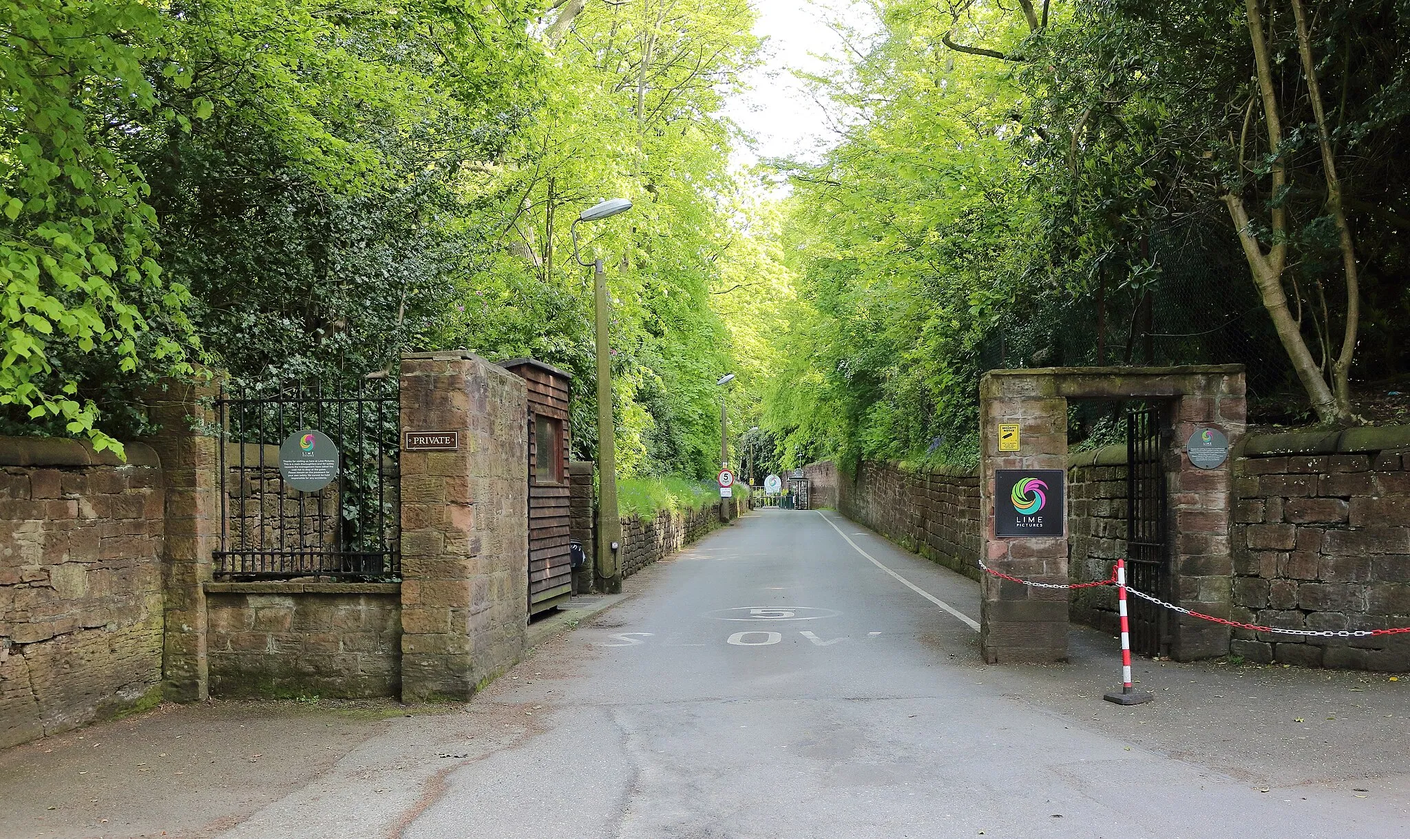 Photo showing: Entrance on Childwall Abbey Road, Liverpool to Lime Pictures, the studios responsible for Brookside, some of Grange Hill, and Hollyoaks. There's usually a gaggle of fans here hoping to catch a glimpse of their favourite stars.