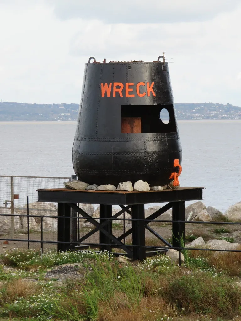 Photo showing: 'WRECK' buoy next to the Duke of Lancaster