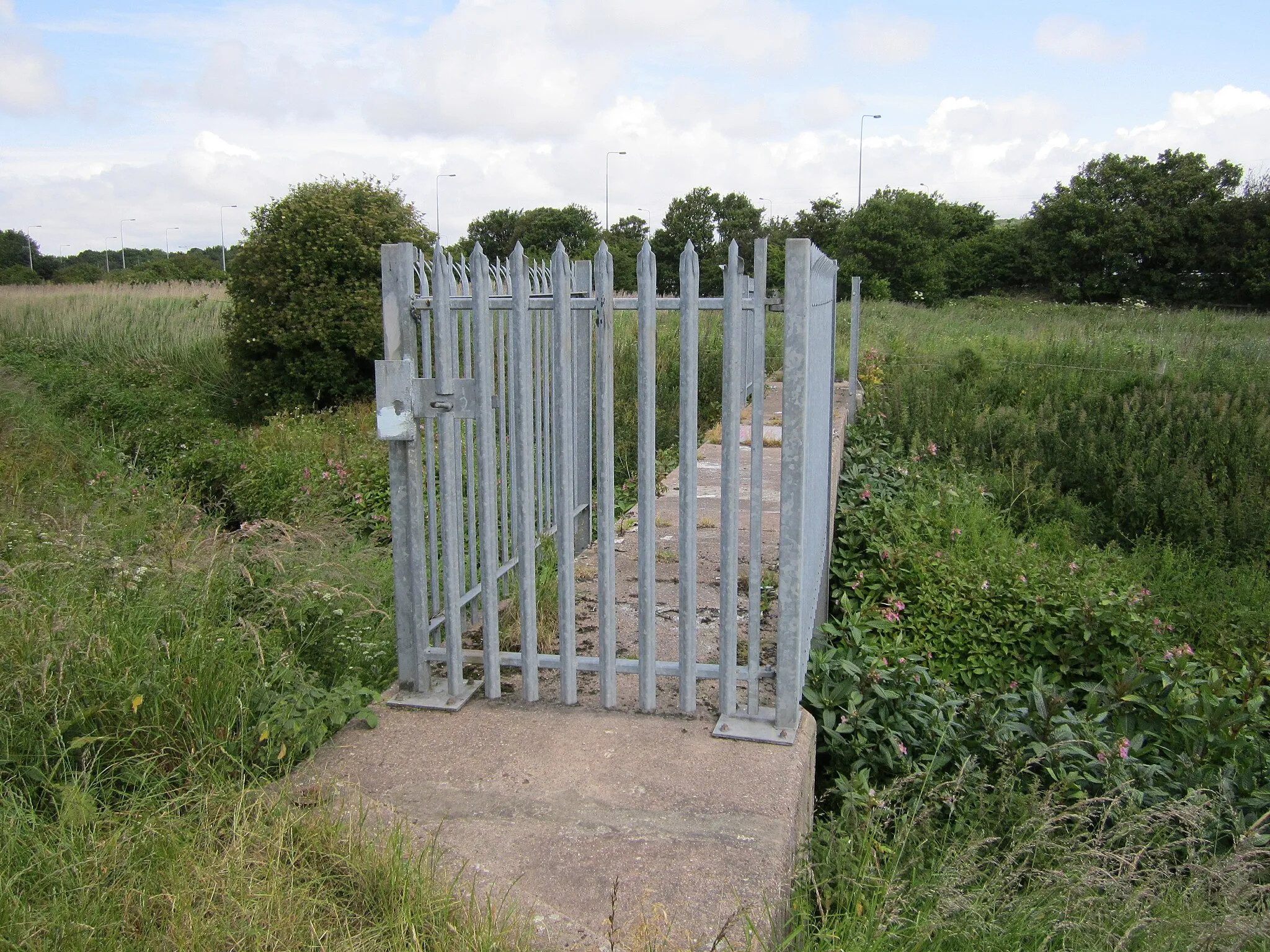 Photo showing: Barrier on a concrete structure crossing the River Fender at Upton, Wirral, England.