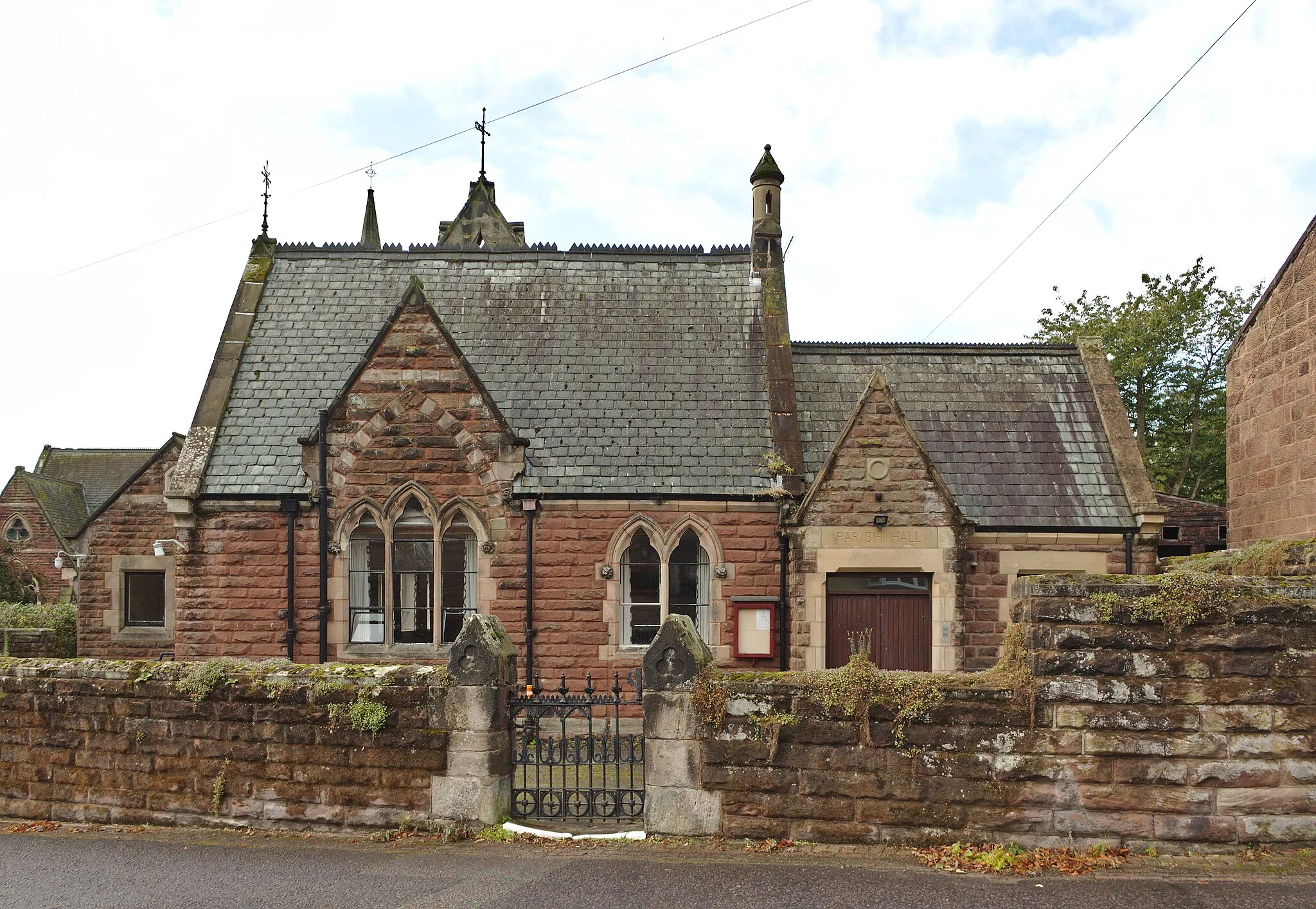 Photo showing: The front entrance of All Saints parish hall, on Church Road.