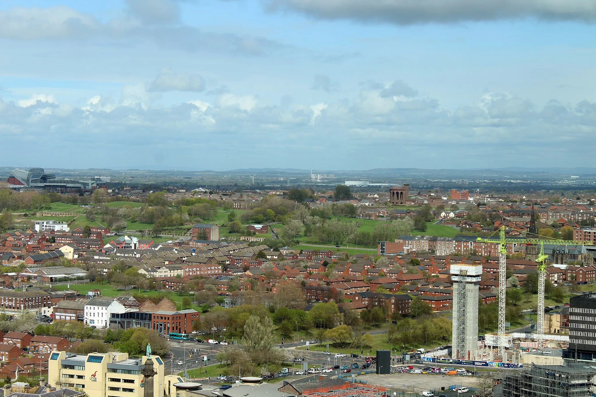 Photo showing: View northeast over Everton Park; Anfield Stadium to the left, Everton water tower to the right.