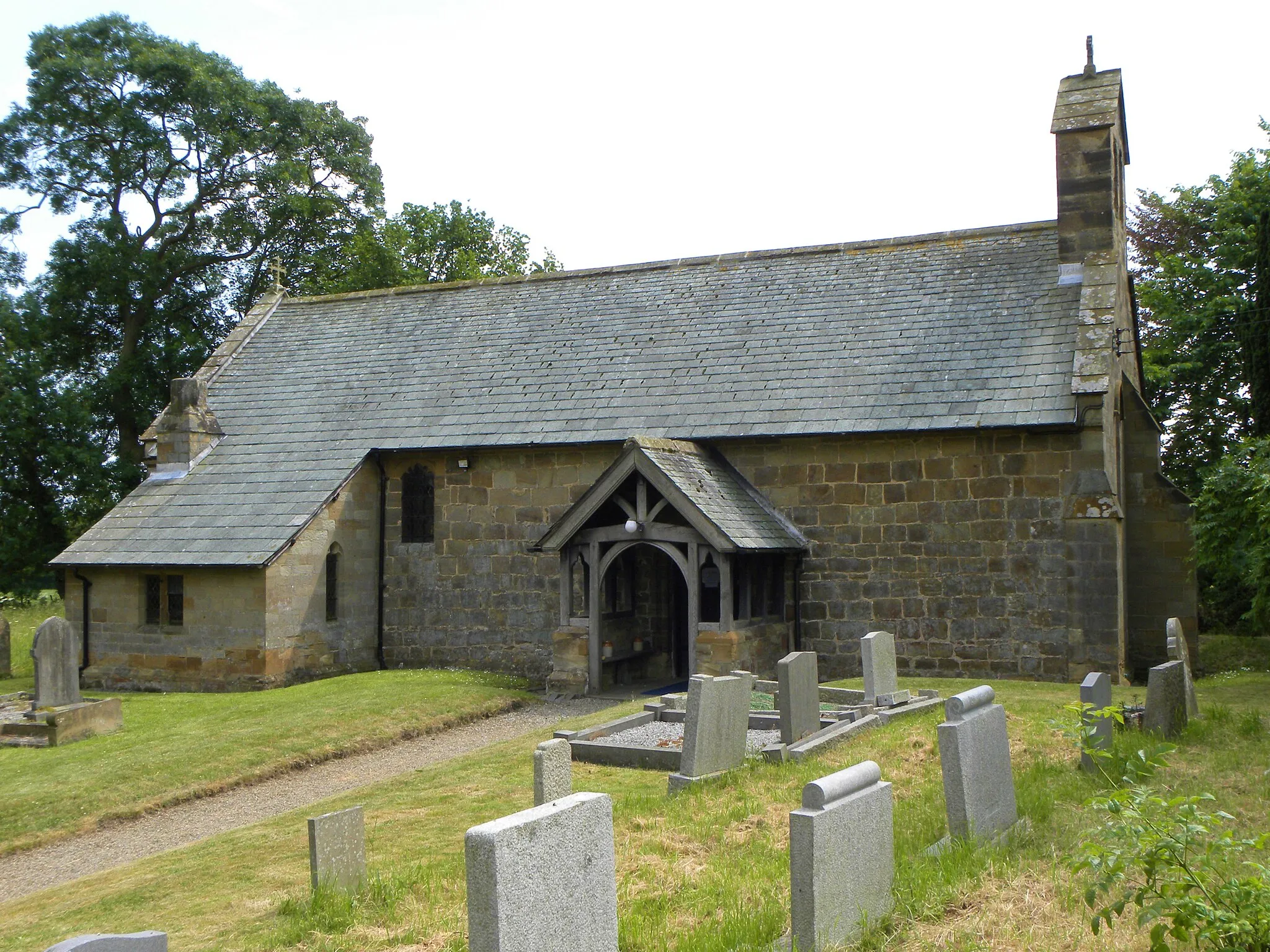Photo showing: The Norman stone church of St Leonard s in Farlington, North Yorkshire.