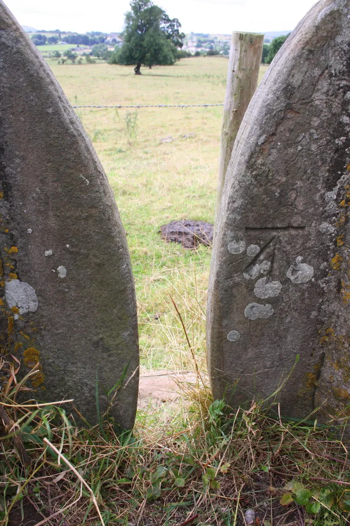 Photo showing: Benchmark on stile in wall beside Wood Lane