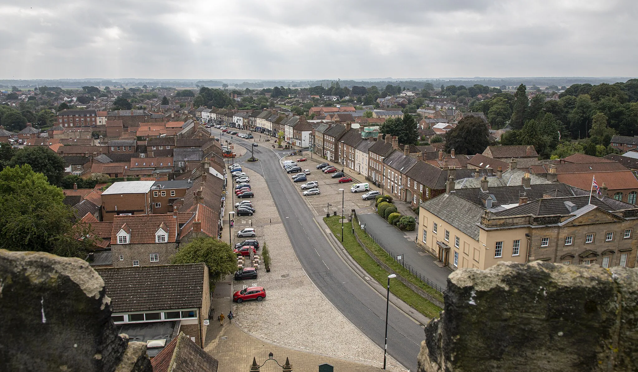 Photo showing: The town of Bedale from the tower of the Church of St Gregory. This is looking south over the main street through the town