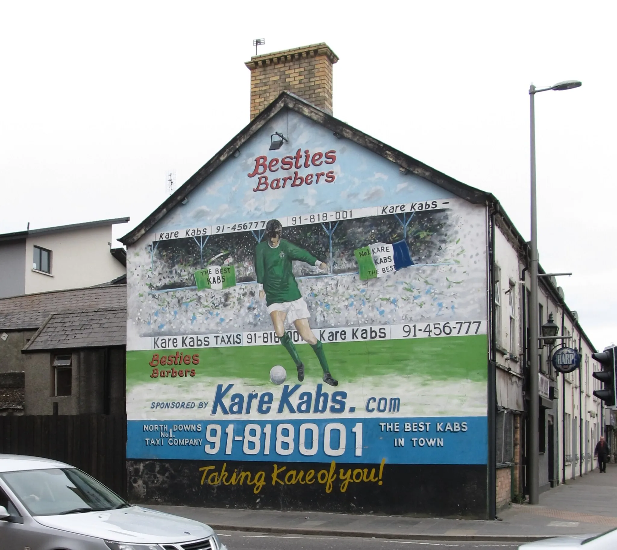 Photo showing: Kare Kabs Mural on the corner of Regent Street and Gibsons Lane