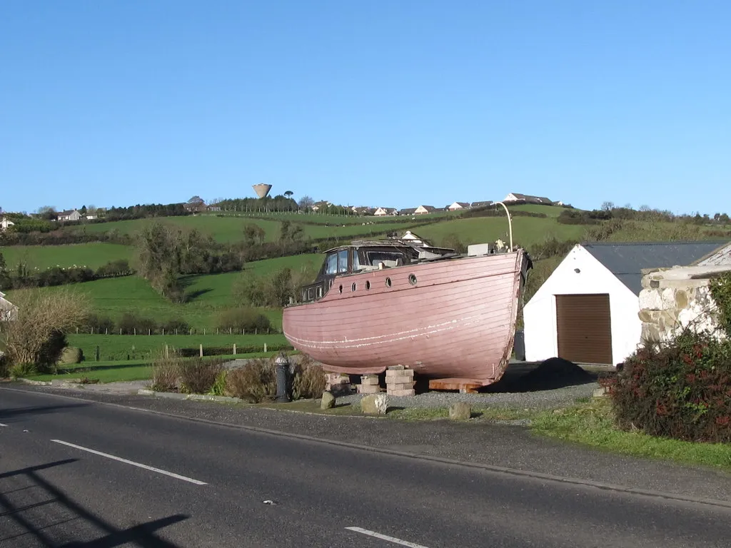 Photo showing: A boat alongside the Castlewellan Road