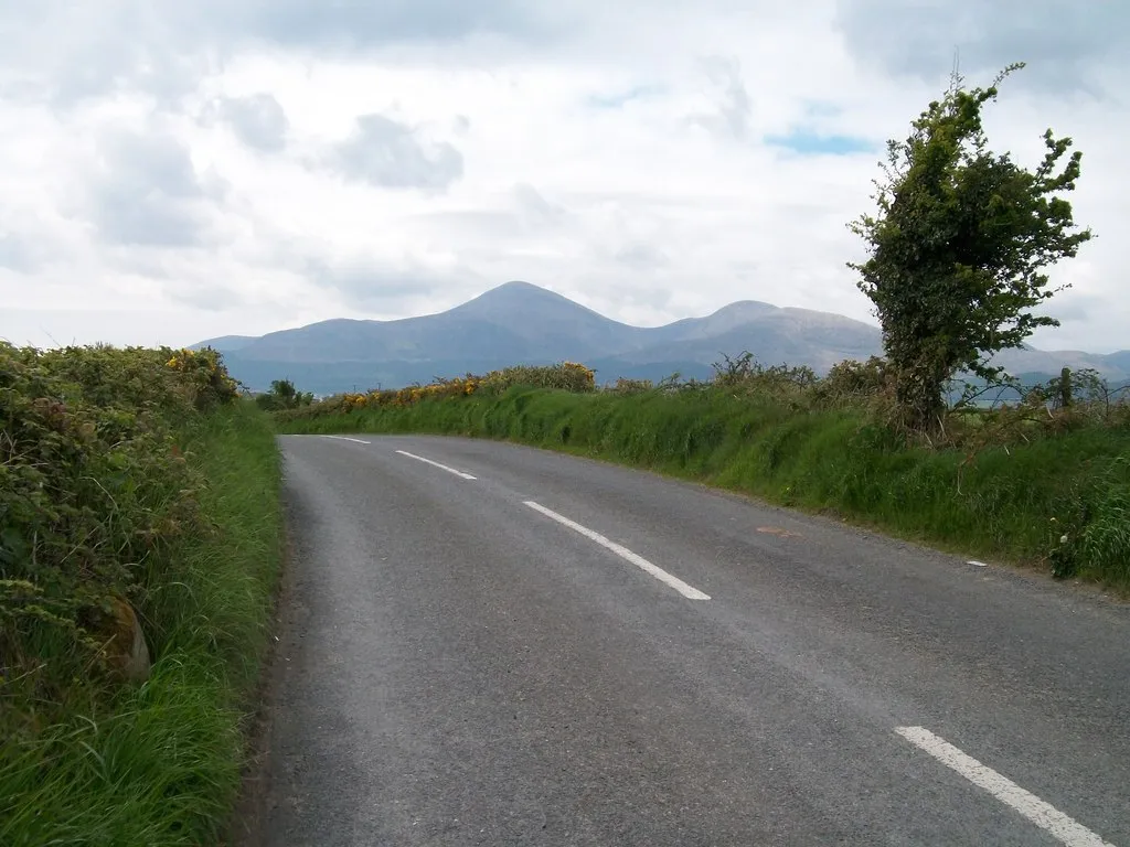 Photo showing: A bend in the Old Road with Slieve Donard in the background