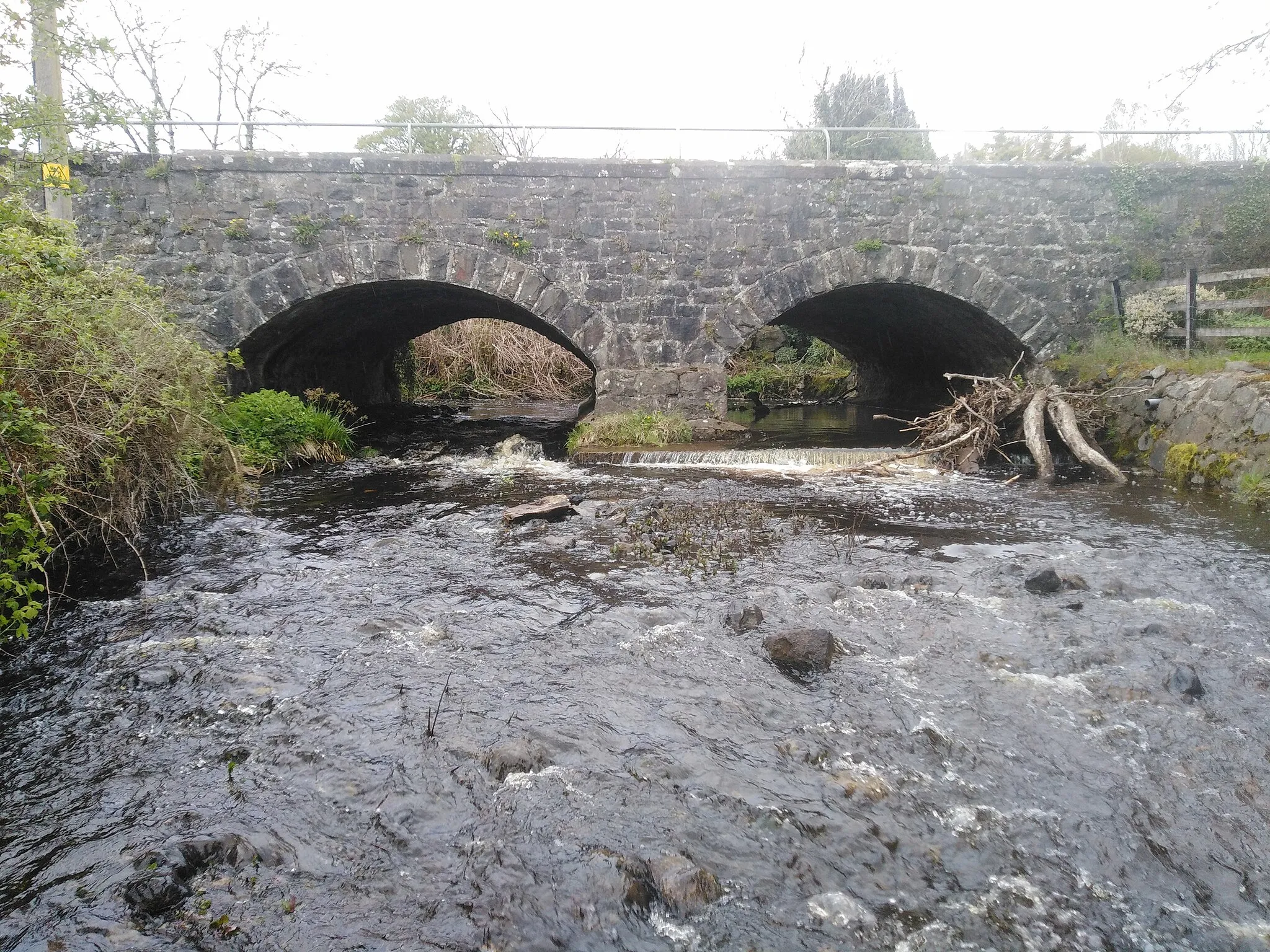 Photo showing: A very old bridge which spans the Knockoneil River built in the 18 century widened in the 19 century