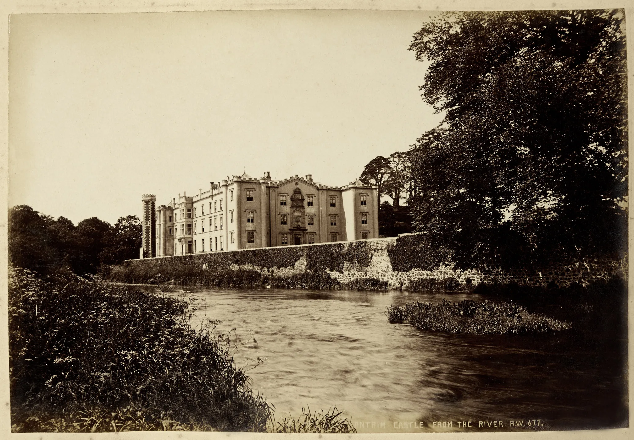 Photo showing: Creator: R. Welch (Photographer) Date: c.1888
Original Format: Photographic Print
Description: View of Antrim Castle from the river
PRONI Ref: D1403_1~017~A
Copying and copyright:
Please see www.proni.gov.uk/index/research_and_records_held/copying_...
For Copy Orders, contact:
Email: proni@dcalni.gov.uk
For fees and charges see: www.proni.gov.uk/index/about_proni/are_there_any_fees_and...