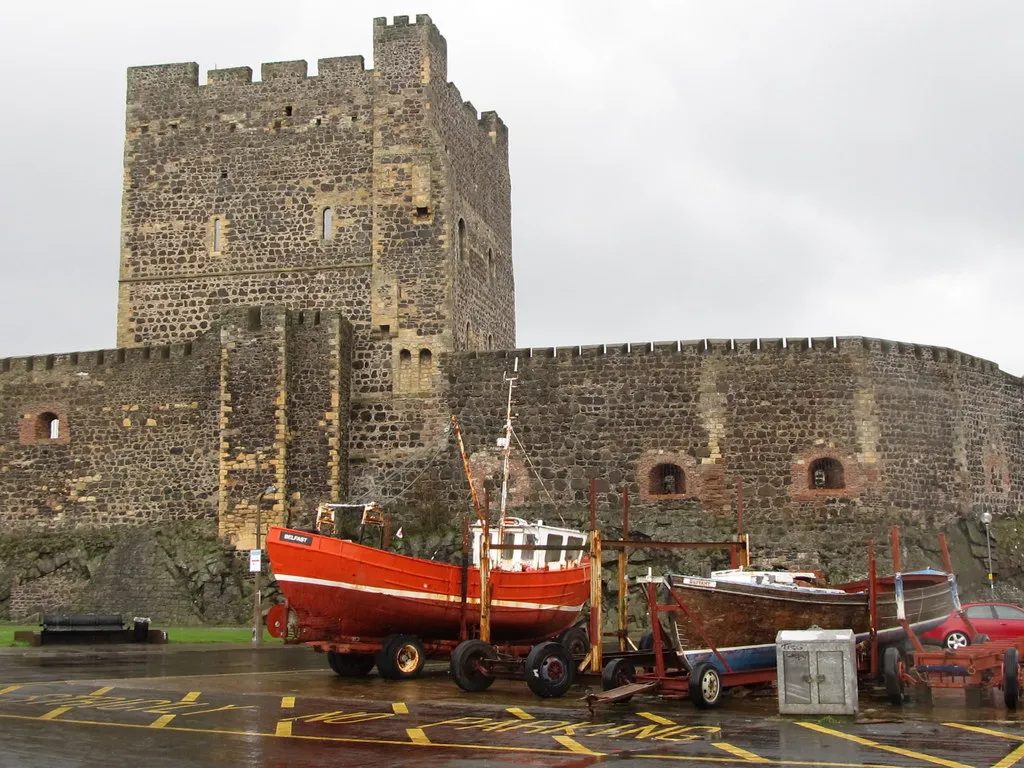 Photo showing: The Belfast and Defiant below the walls of Carrickfergus Castle