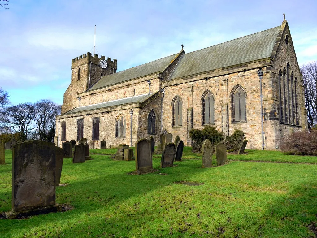 Photo showing: St Mary the Virgin, Parish Church of Easington The south aspect. The church tower is the earliest part of the building, dating from the mid C12. It is a prominent landmark from the sea and in pre-GPS days was an important navigation aid for progress along the Durham coast.