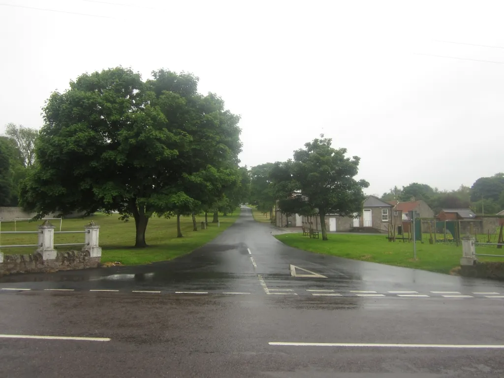 Photo showing: Road bisecting the village green, East Ord